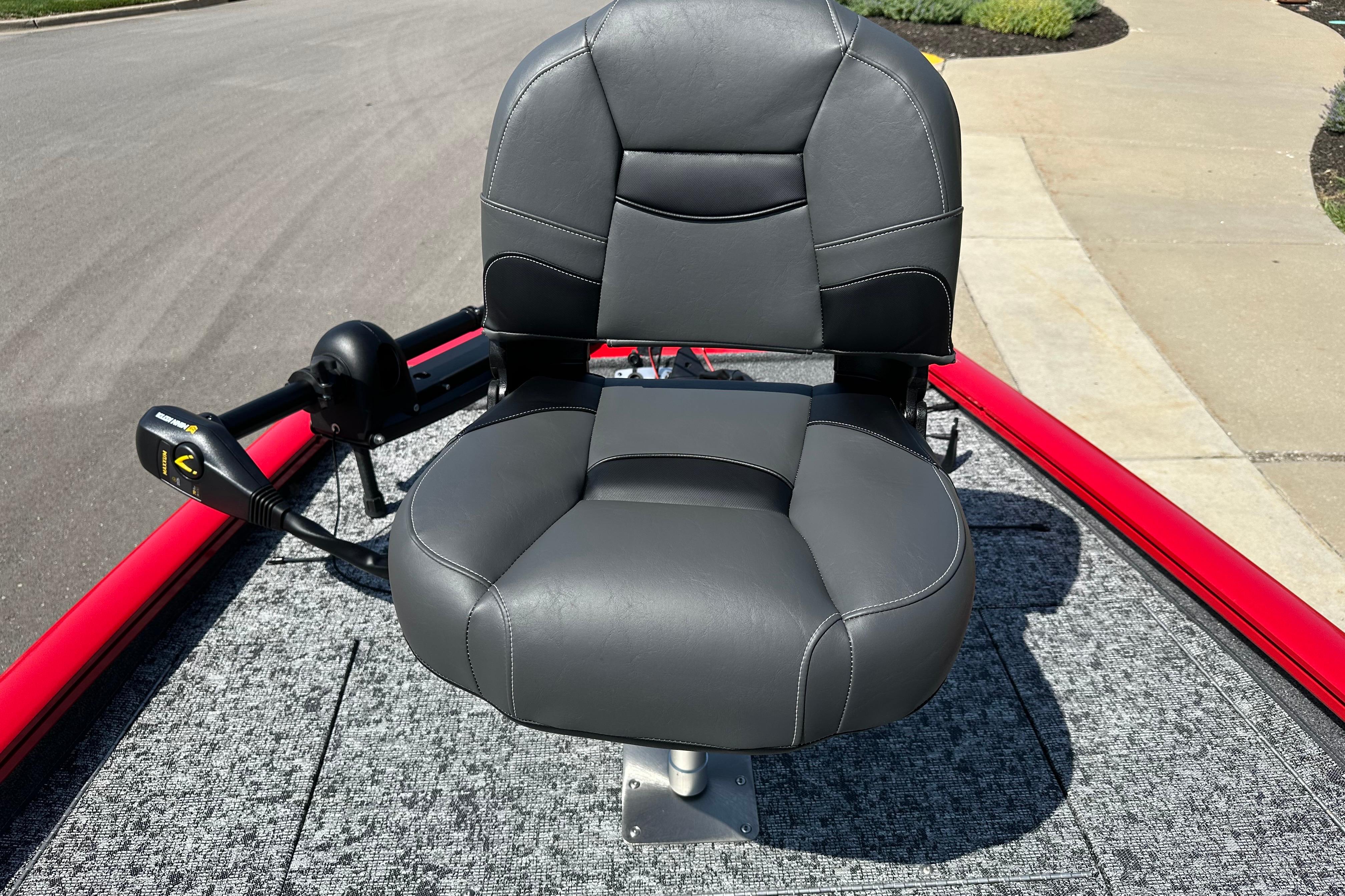 2026 Tracker Pro Team 195 boat seat with gray upholstery and trolling motor.