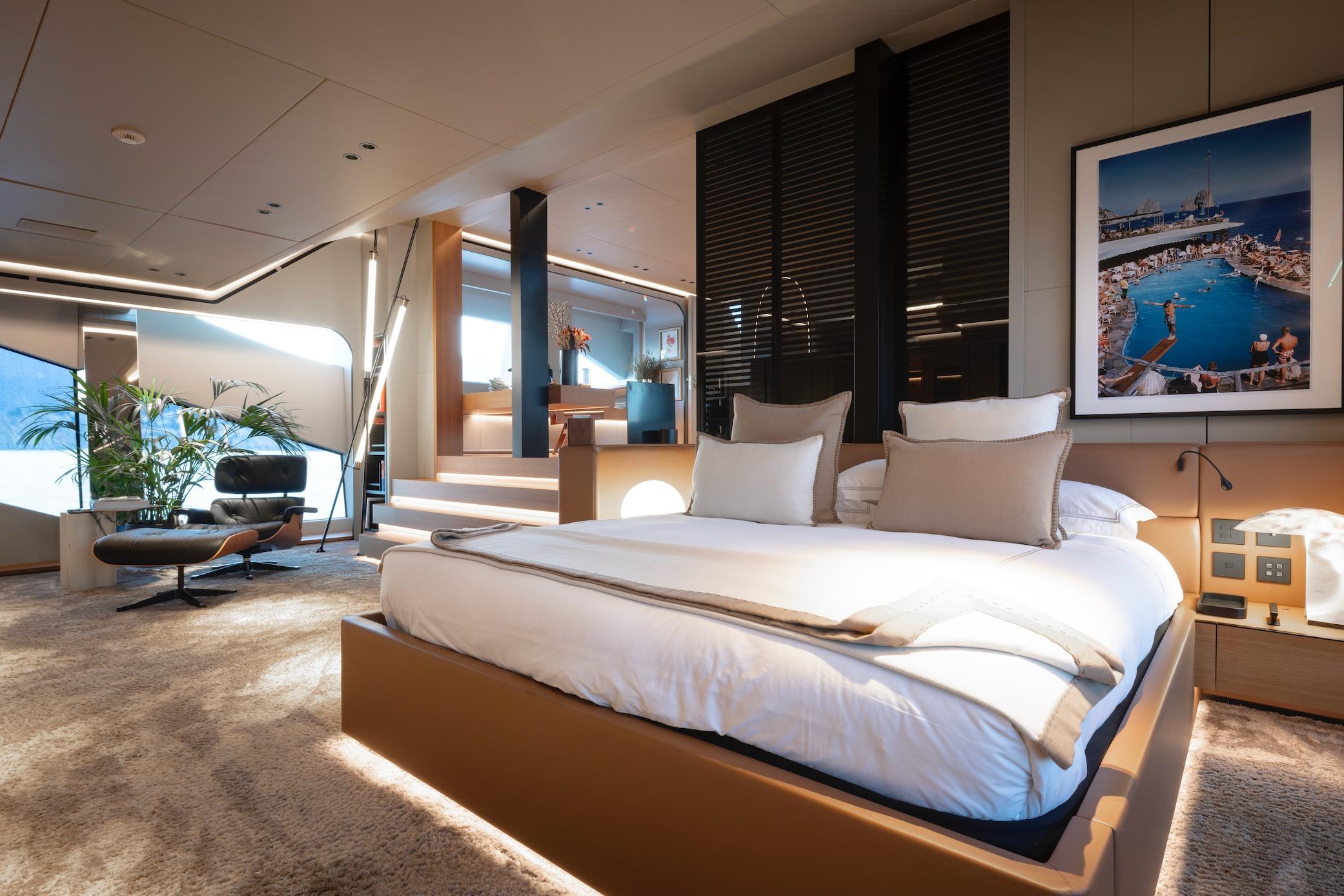 Luxurious 2023 Overmarine Mangusta 165 Rev yacht interior with elegant bedroom and modern decor.