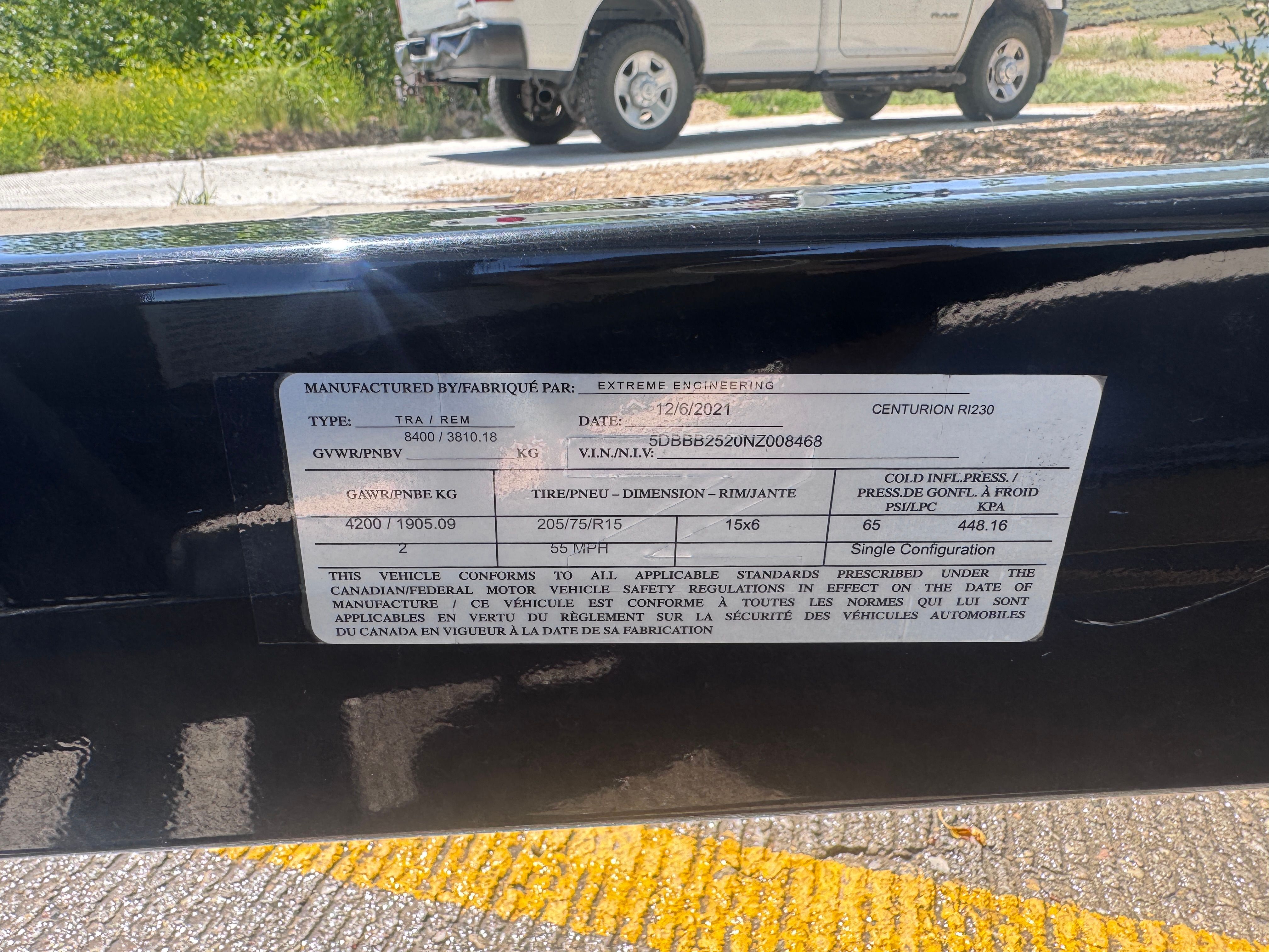 A 2022 Centurion Ri230 is parked. A label displays technical details.