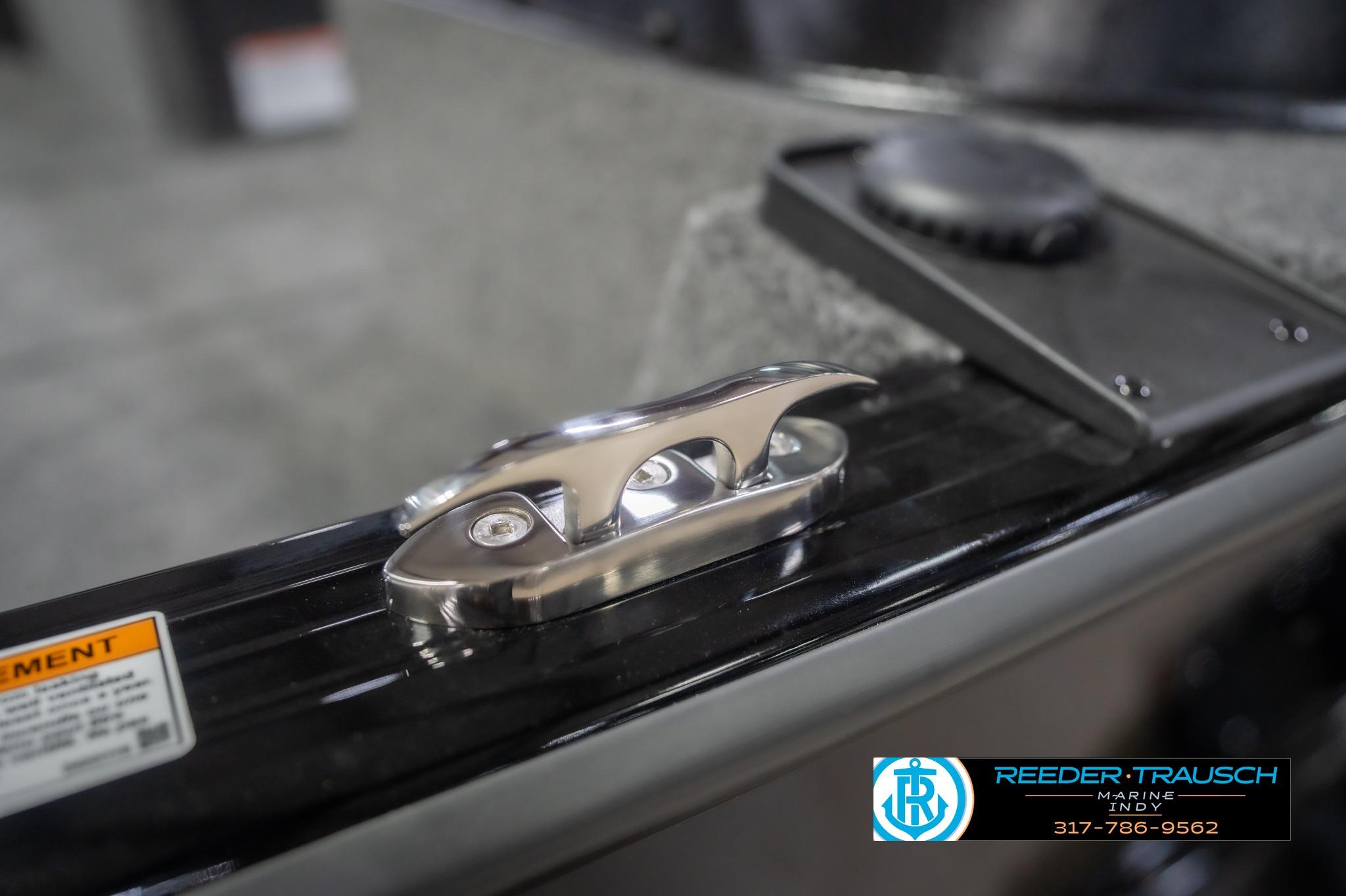 2026 Lund 2075 Impact XS boat cleat detail, Reeder-Trausch Marine branding visible.