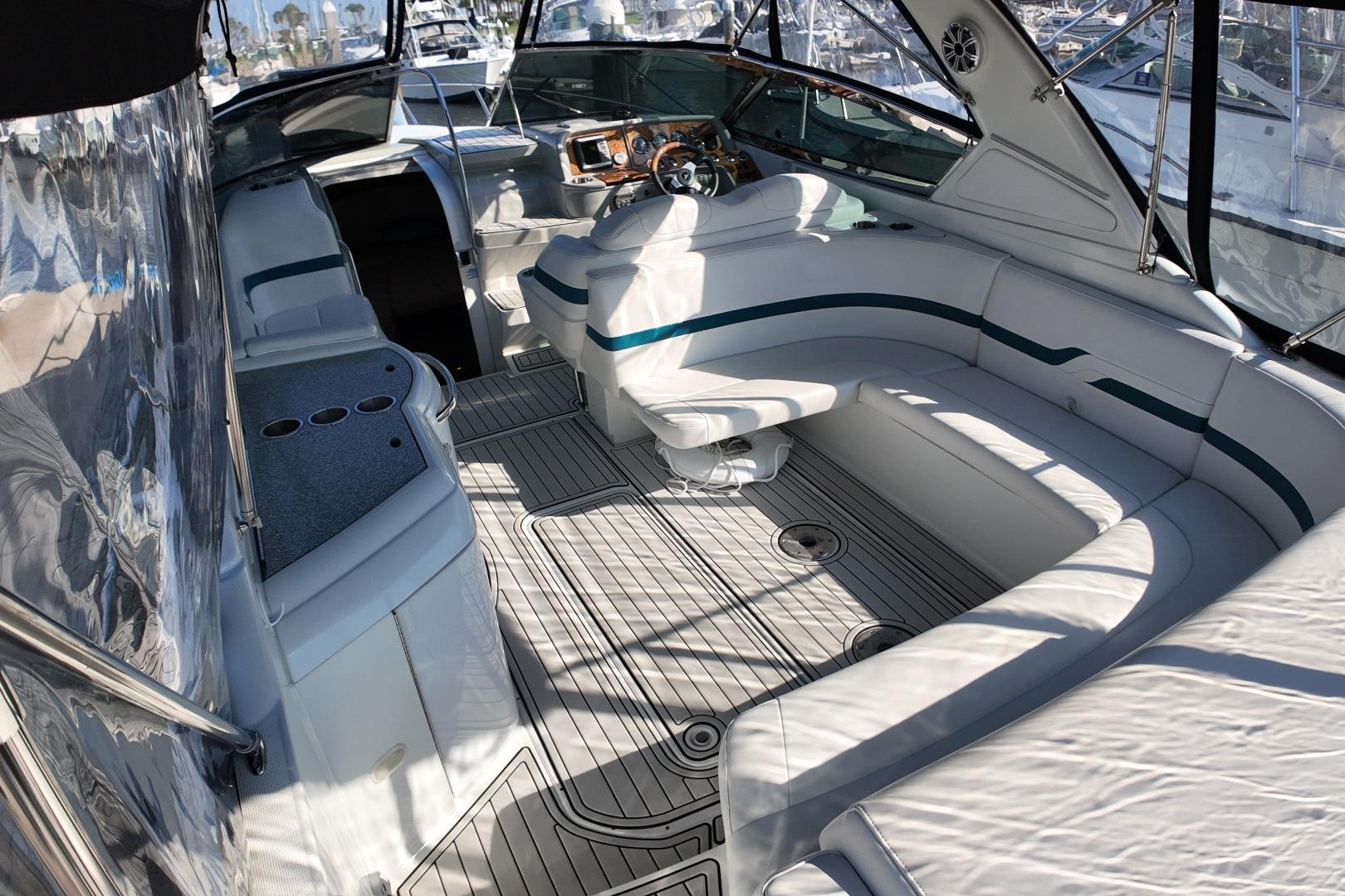 Luxurious interior of a 2007 Formula 330 Sun Sport boat with spacious seating.
