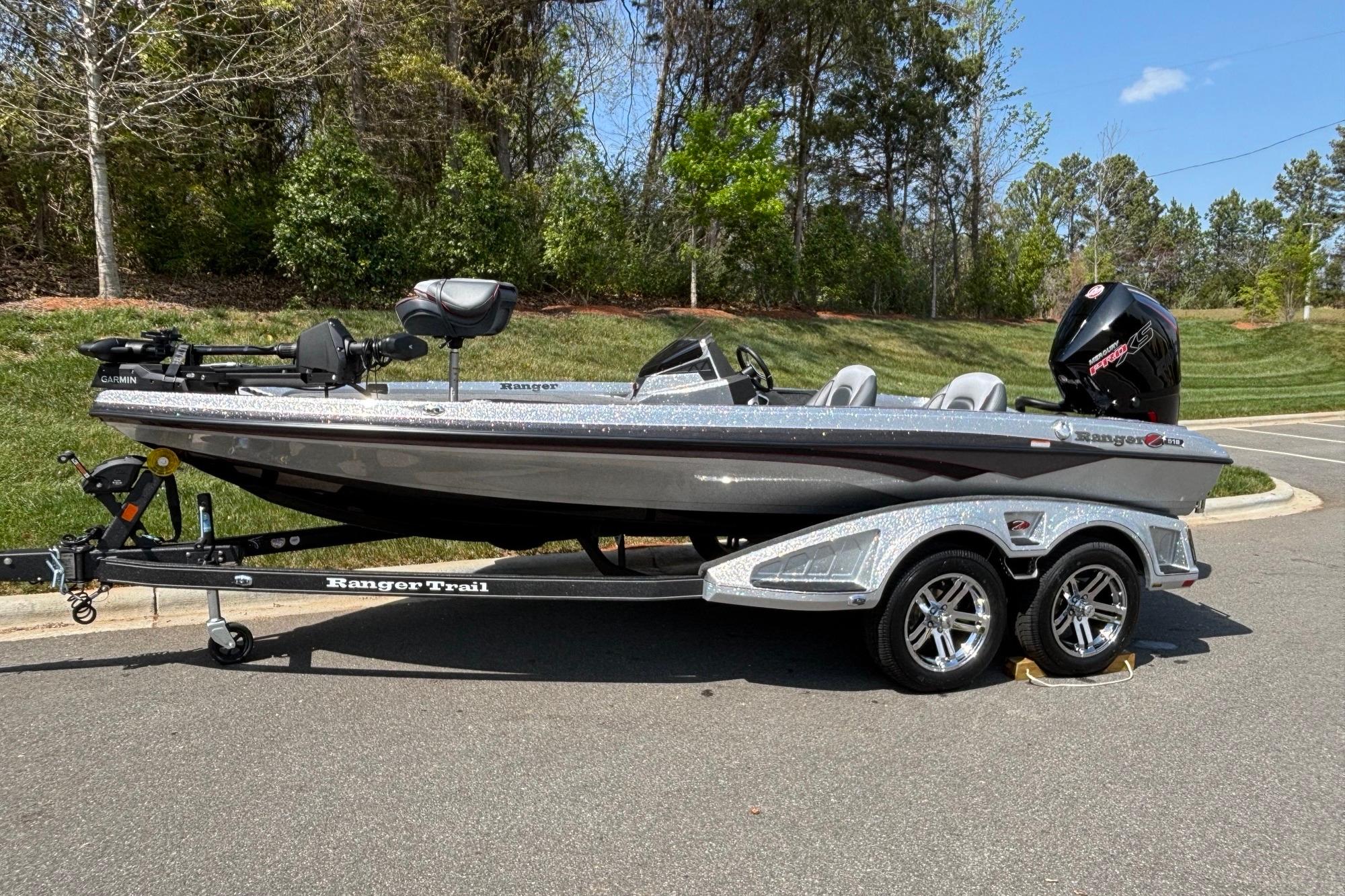 2026 Ranger Z518 Cup-Equipped boat on trailer, parked outdoors.