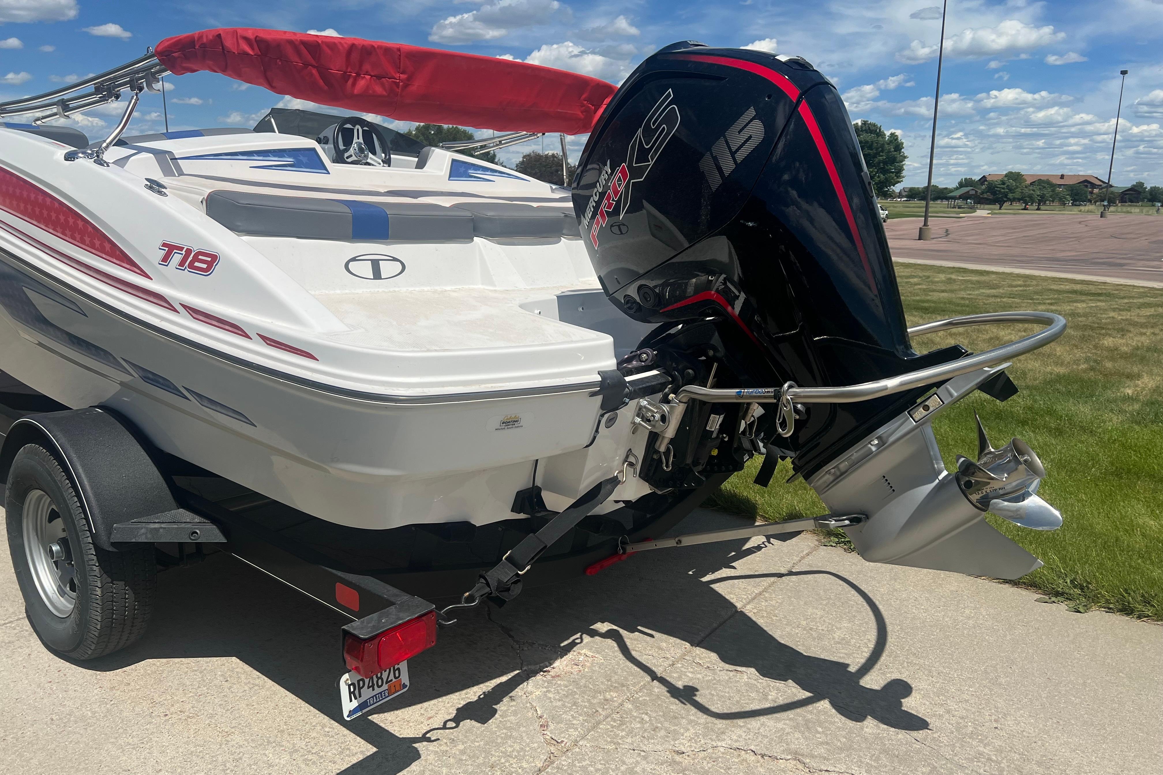 2023 Tahoe T18 boat with Mercury 115 outboard motor on trailer.