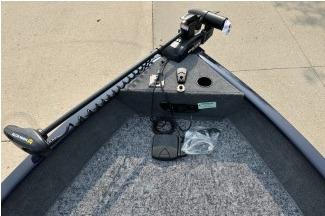 2026 Tracker Pro Guide V-175 WT boat interior with trolling motor and carpeted deck.