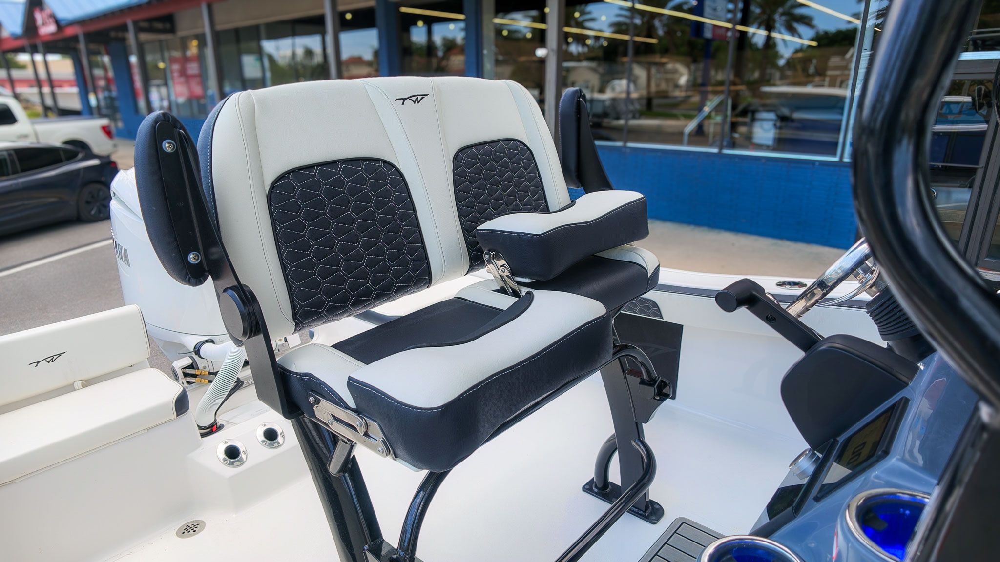 The Tidewater 198 CC Adventure seats are modern and comfortable, featuring black and white upholstery.