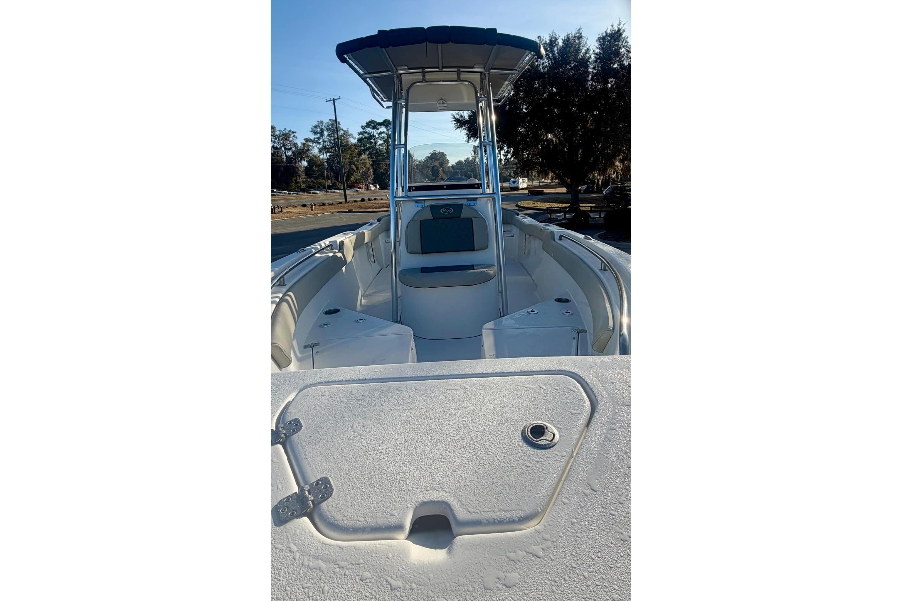 2026 Key West 203 FS boat interior with seating and storage compartments.