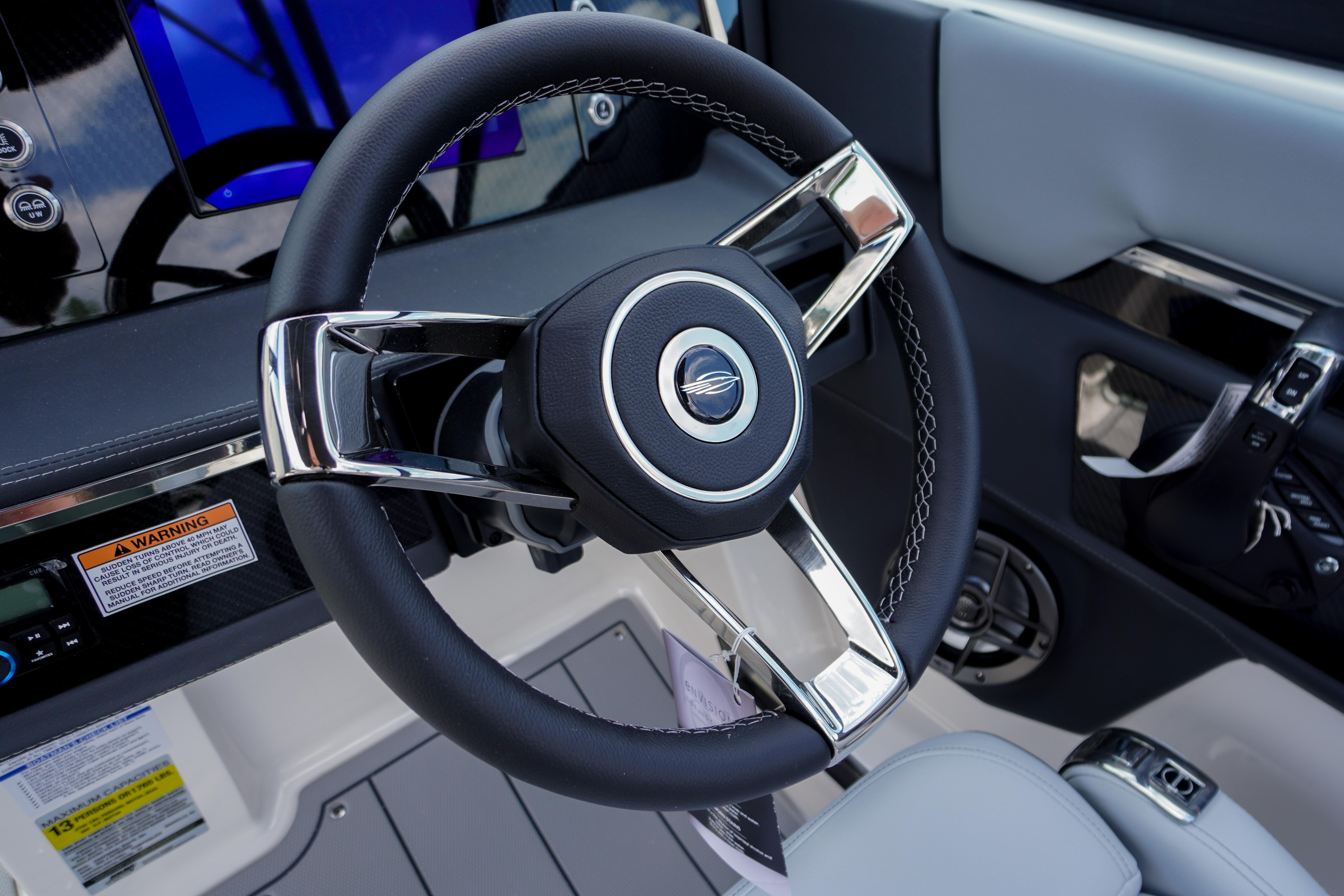 2026 Chaparral SSX 4 steering wheel and dashboard, featuring modern design elements.