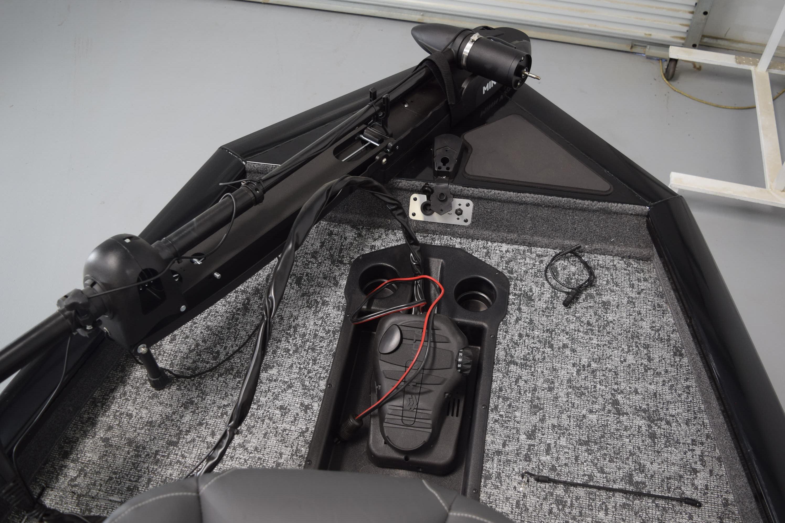 2026 Tracker Pro Team 175 boat interior with trolling motor and control panel.