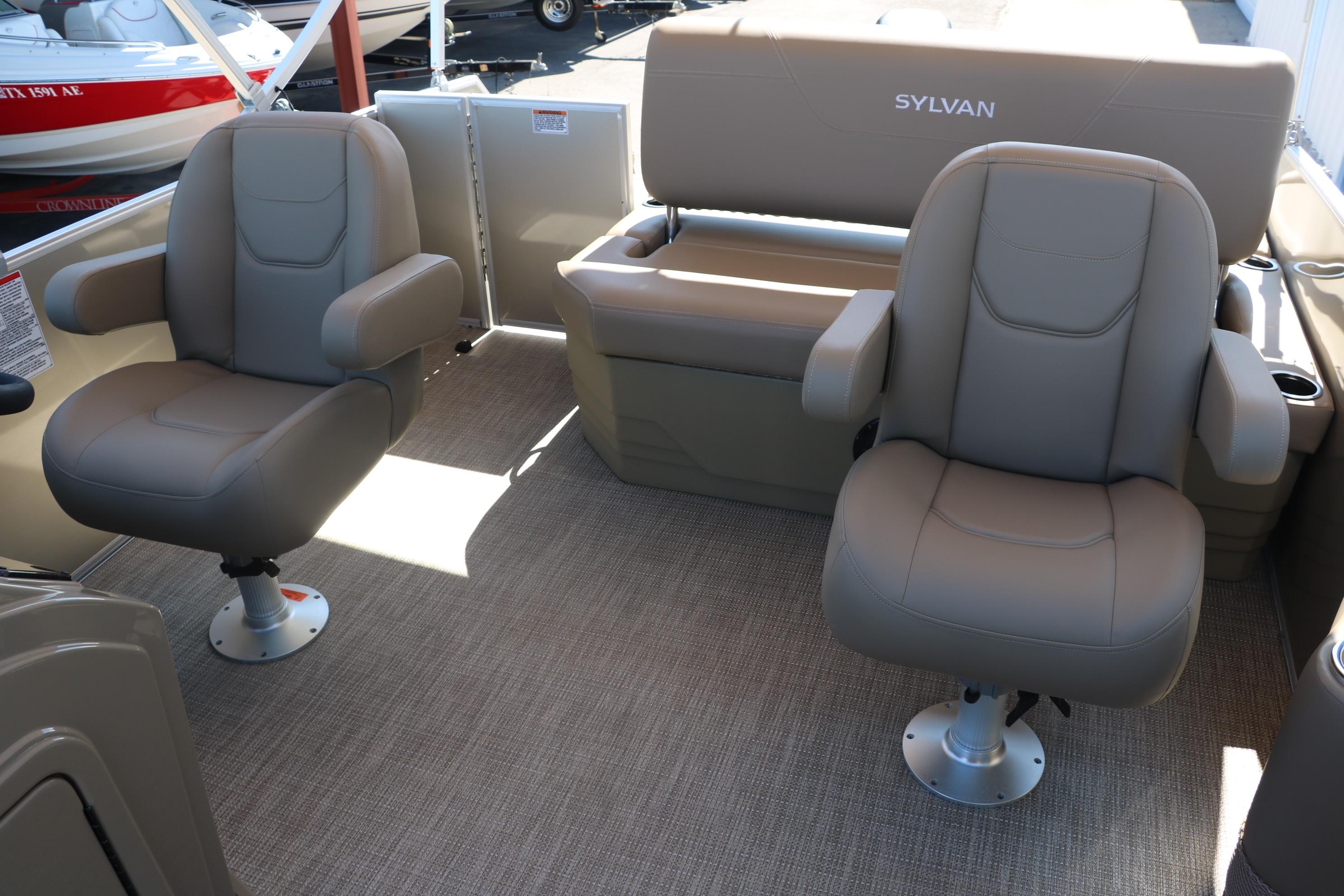 2025 Sylvan Mirage 820 CLZ DH boat interior with comfortable seating arrangement.