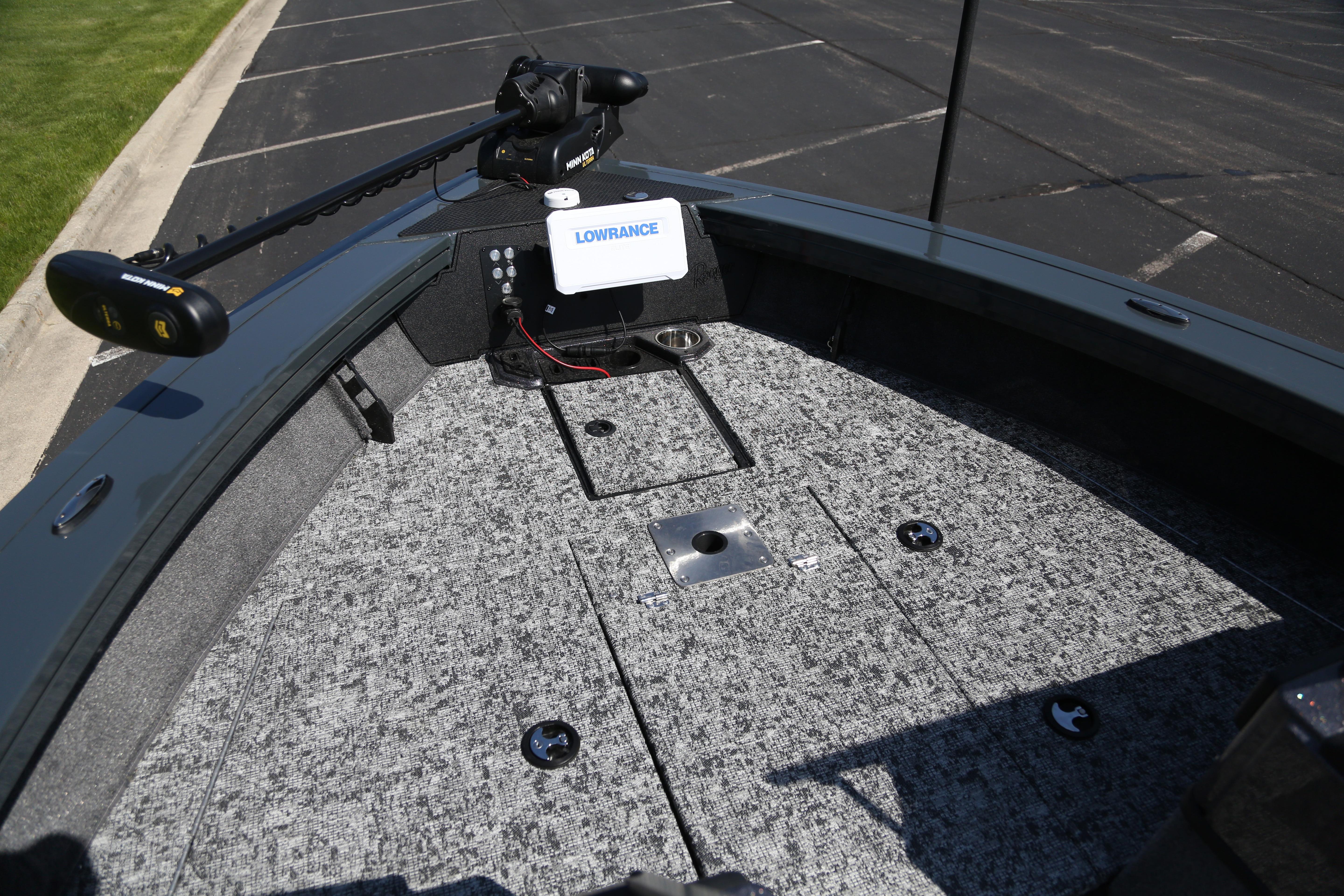 2026 Ranger VX1888 WT boat deck with Lowrance electronics and trolling motor in parking lot.