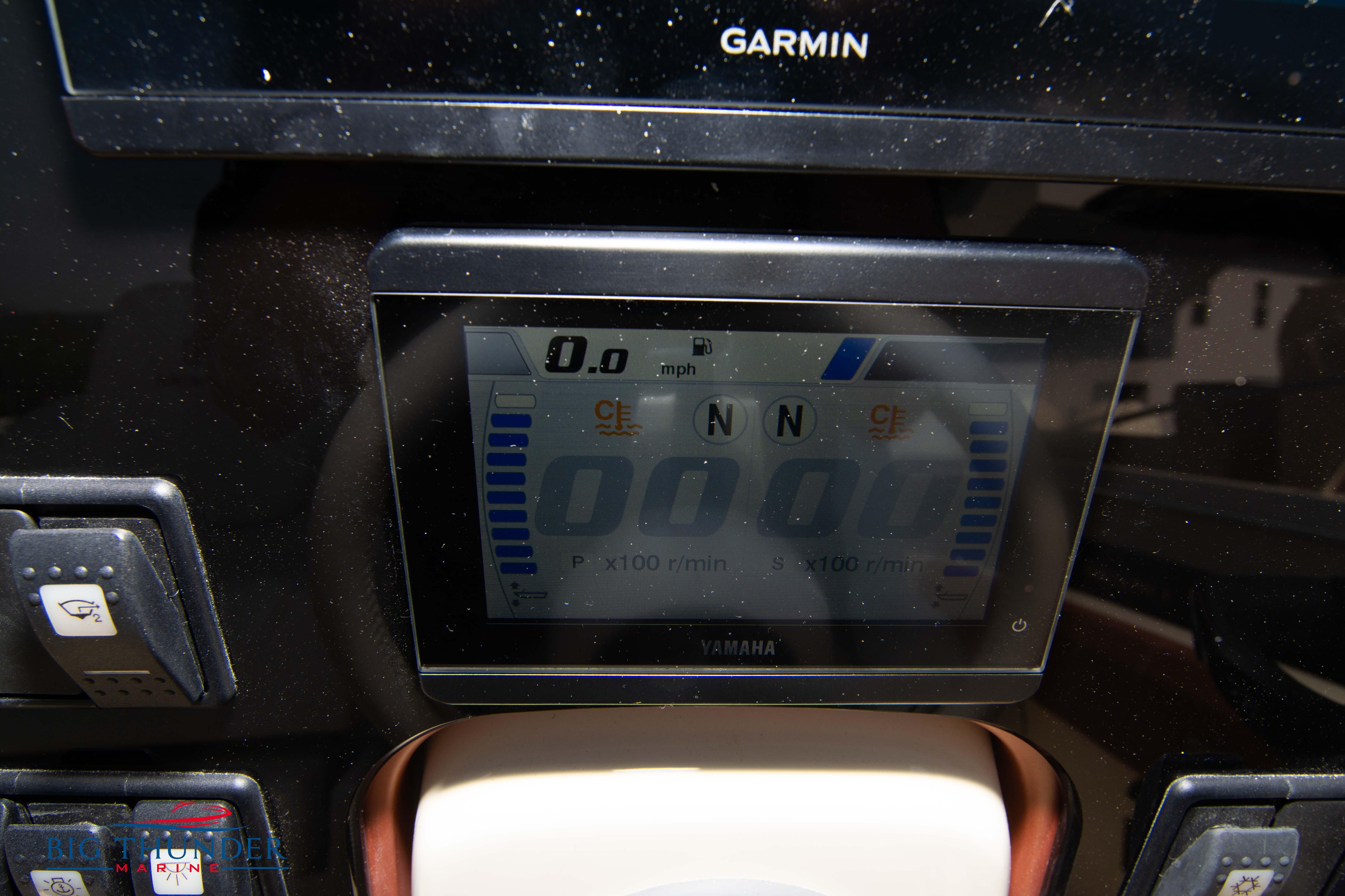 2024 Capoforte FX270 dashboard with Garmin and Yamaha displays.