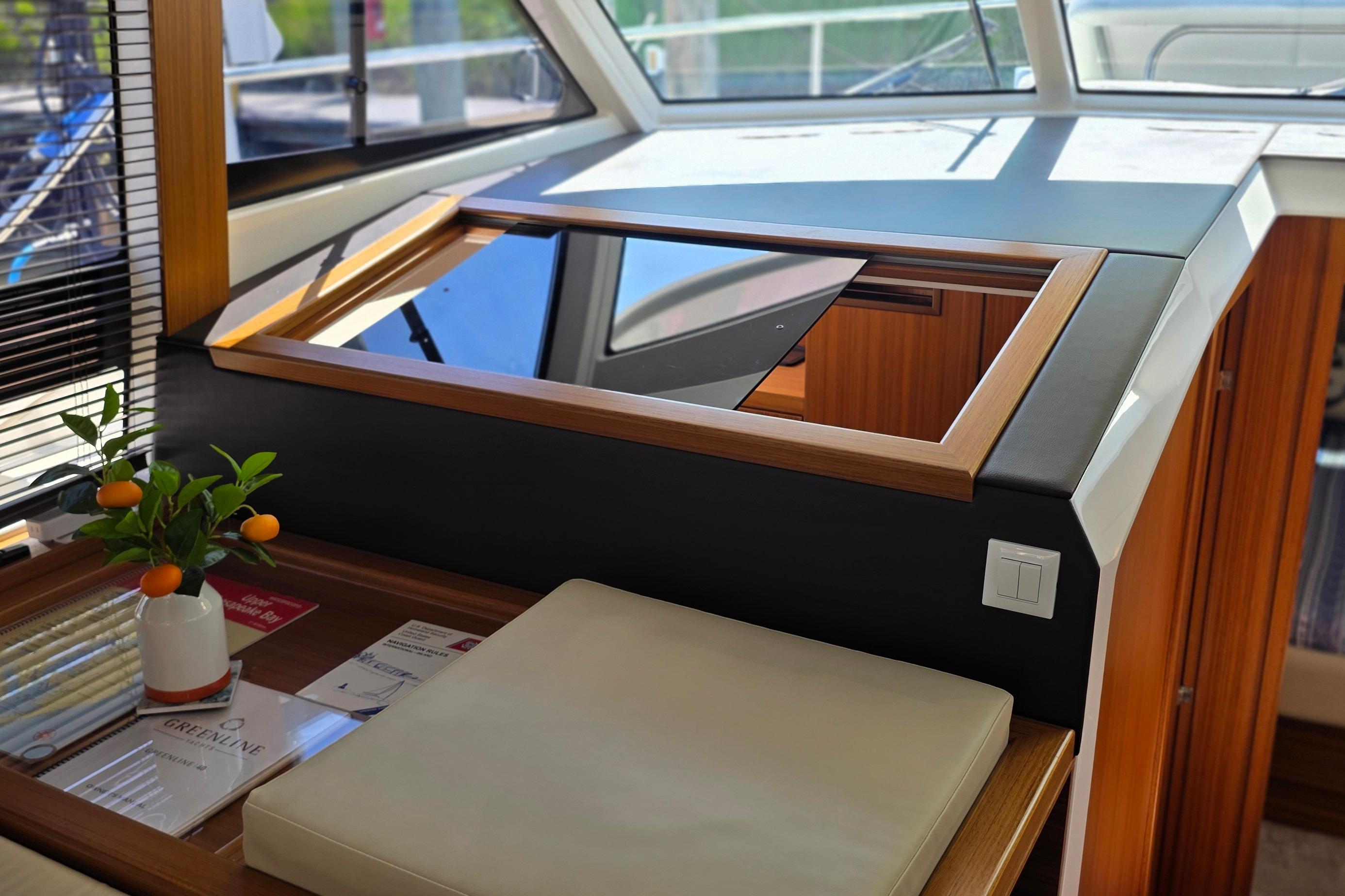 Interior of 2023 Greenline 40 yacht with modern design and natural light.