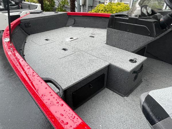 2021 Crestliner 1650 Fish Hawk SC boat interior with red trim and storage compartments.