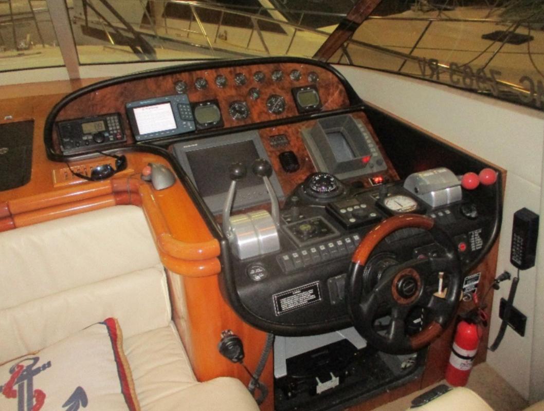 Control panel of a 2000 Sunseeker Manhattan 62 yacht with navigation instruments.