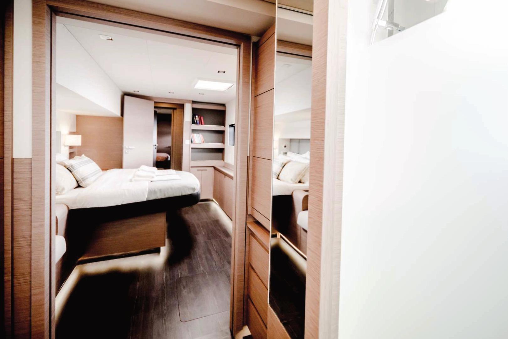 Luxurious cabin interior of 2021 Fountaine Pajot Samana 59 yacht, featuring modern design.