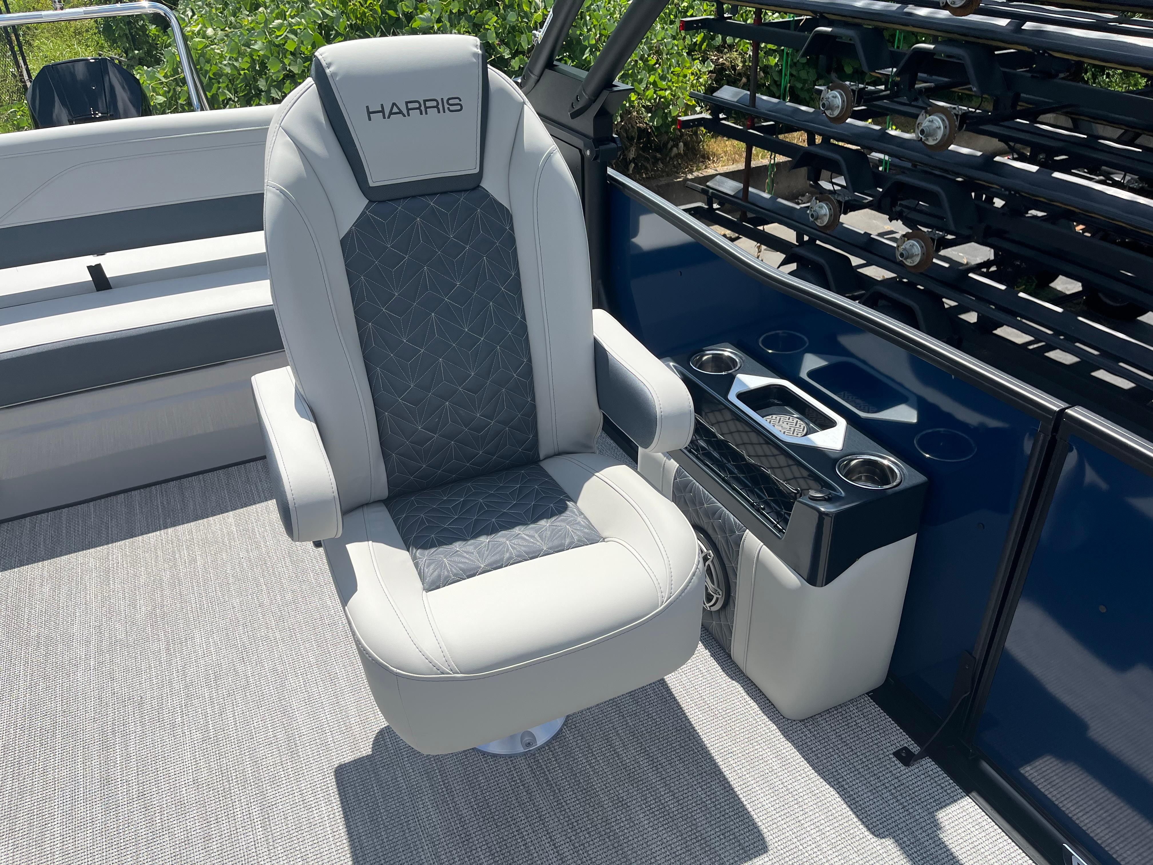 Luxury seating on 2026 Harris Grand Mariner 230 boat, featuring elegant design and comfort.