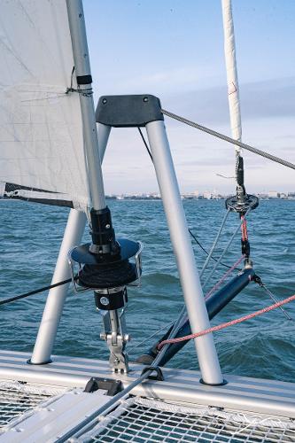 2025 Nautitech 40 Open catamaran sailing on open water, showcasing rigging and sails.