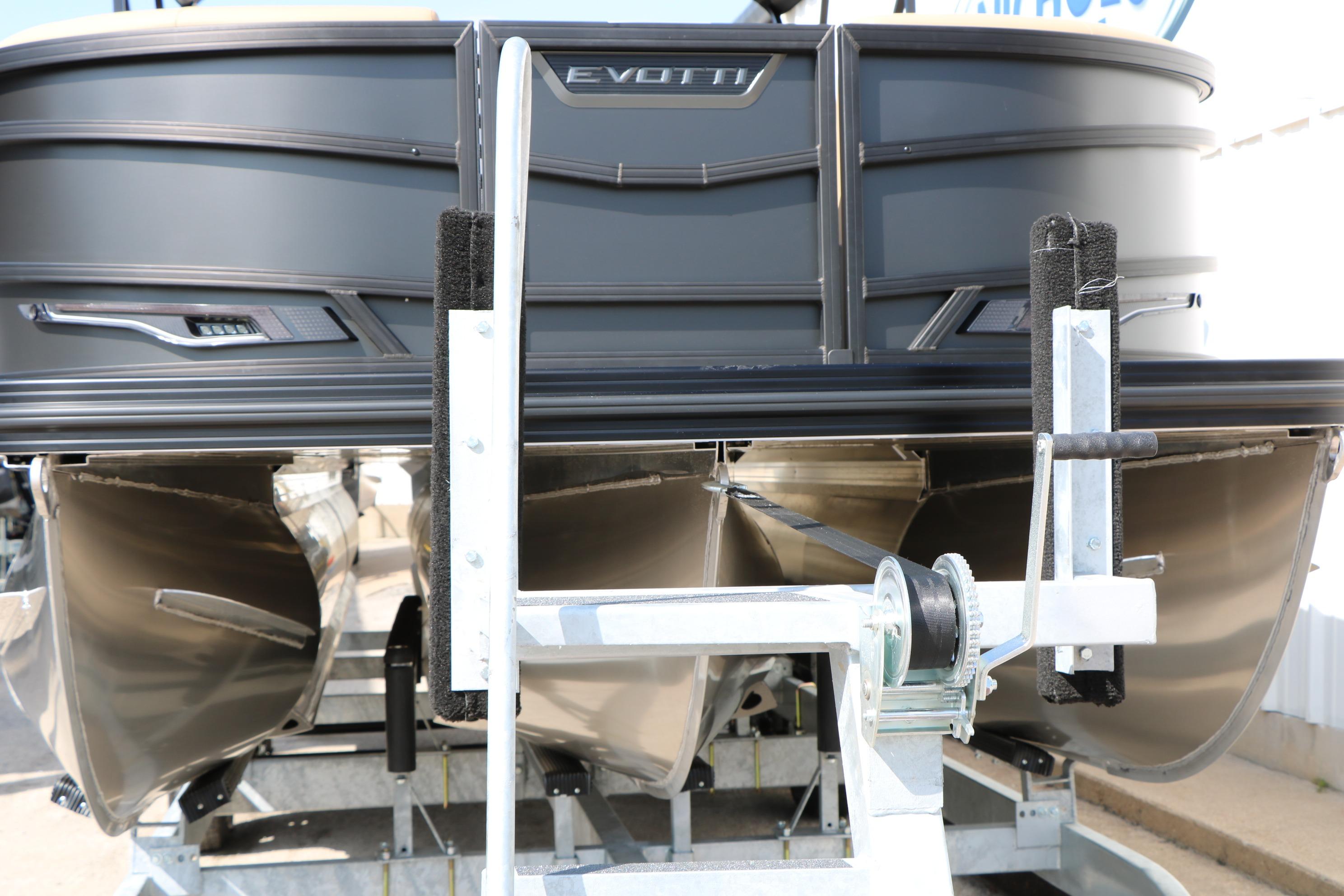 2026 Evotti 723CS pontoon boat on trailer, showcasing sleek design and modern features.