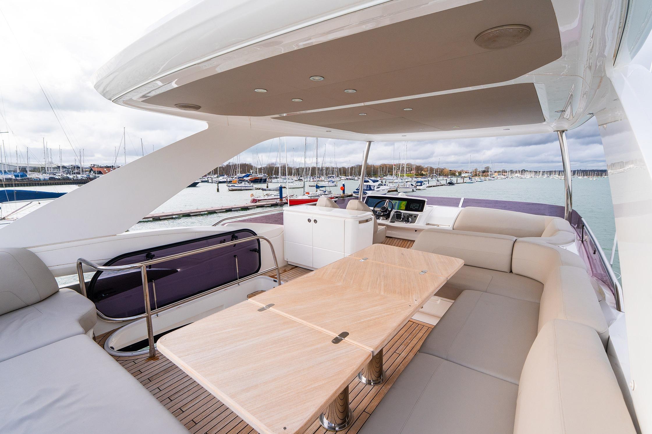 Luxurious 2020 Princess F55 yacht interior with spacious seating and elegant design.