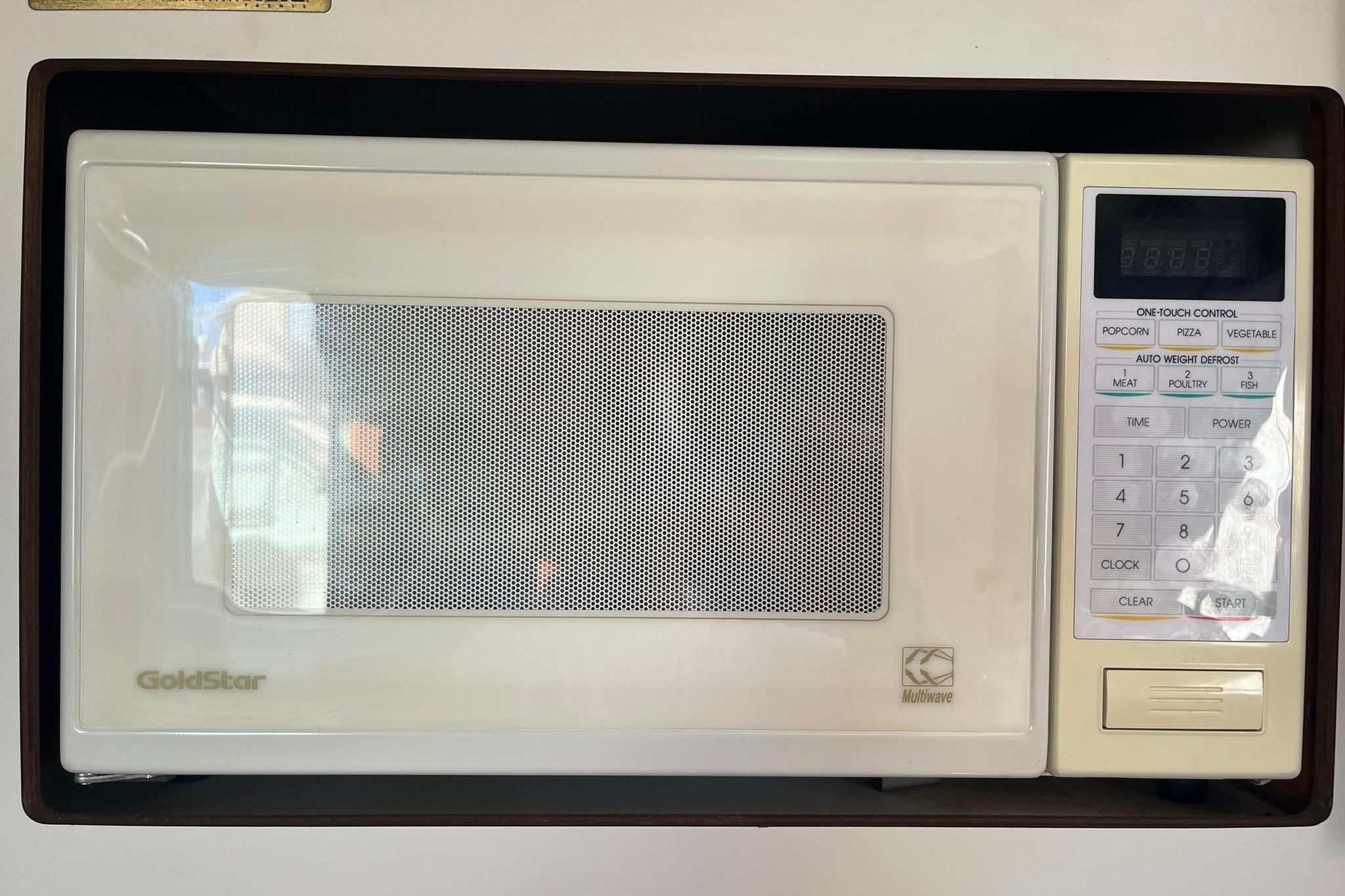 GoldStar microwave with one-touch controls, installed in a 1996 Tiara Yachts 3500 Express.