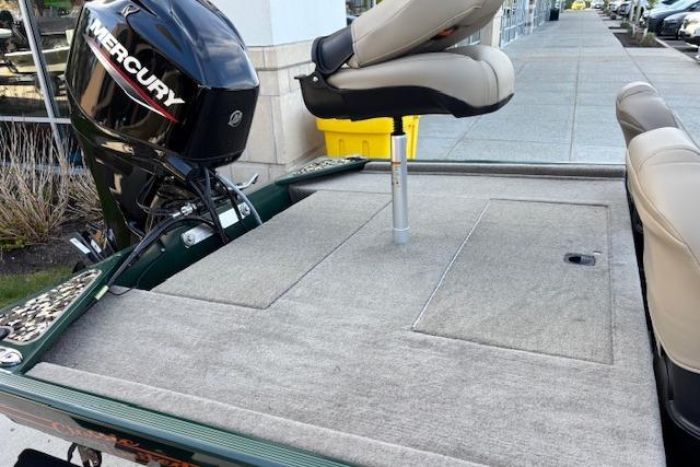 2026 Tracker Bass Tracker Classic Limited boat with Mercury motor and cushioned seating.