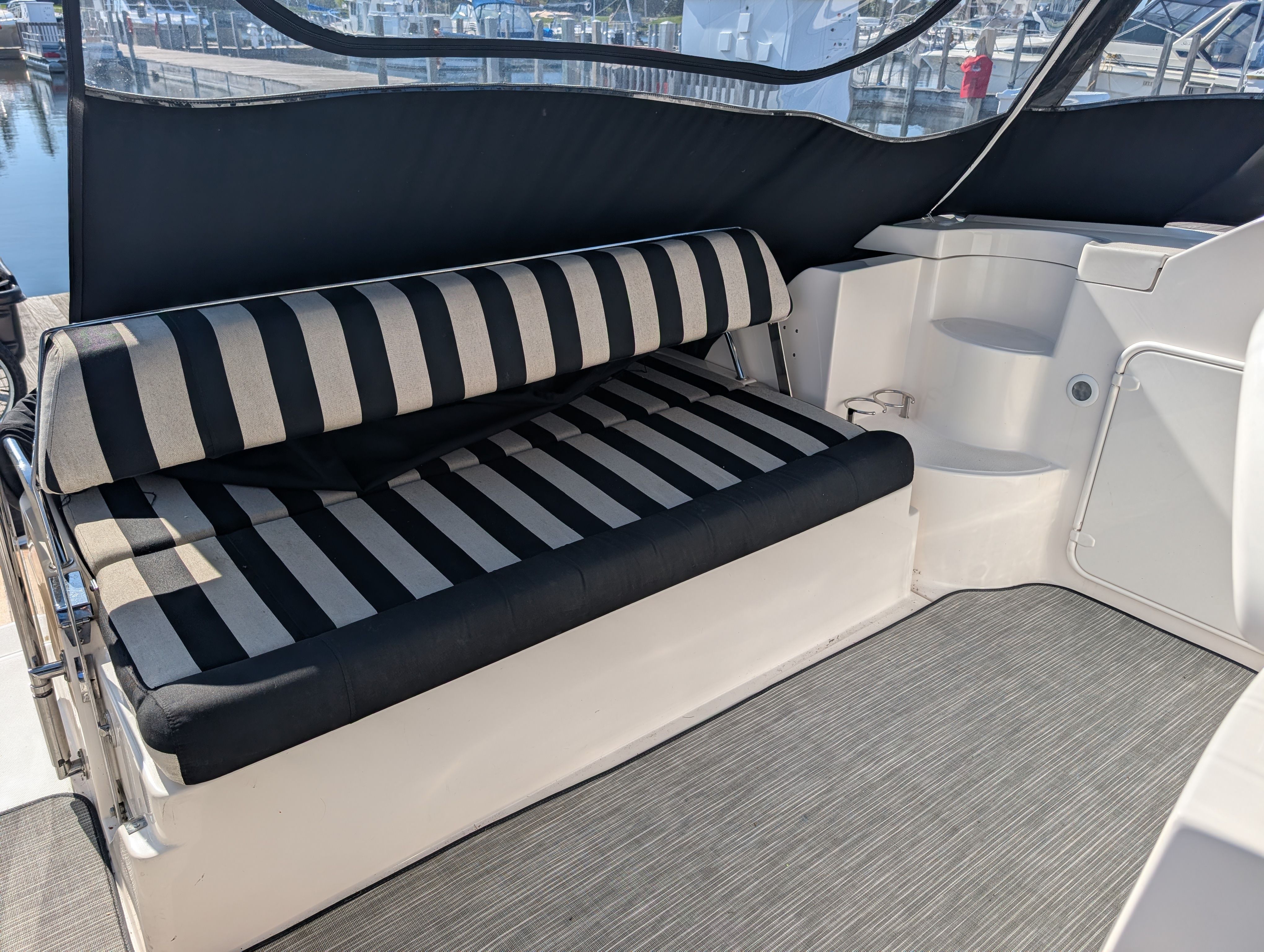 Interior of a 2005 Regal Commodore 3560 yacht with striped seating.