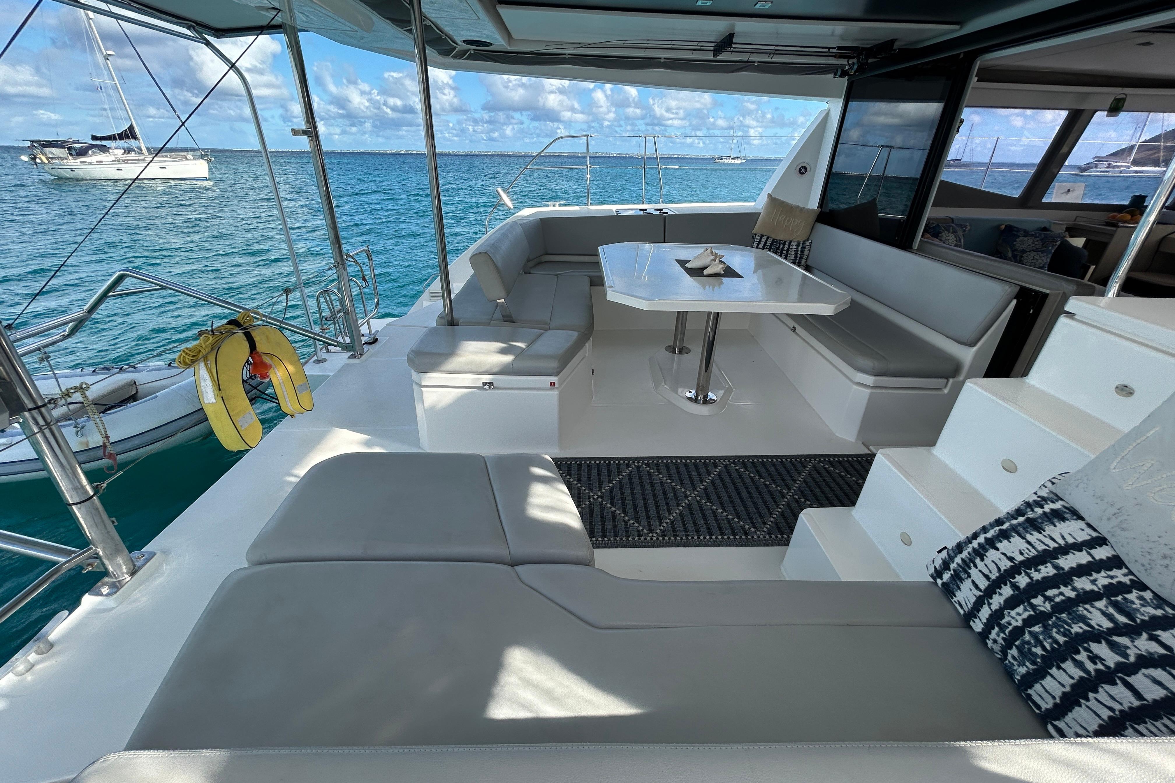 Luxurious 2020 Leopard 45 yacht interior with spacious seating and ocean view.