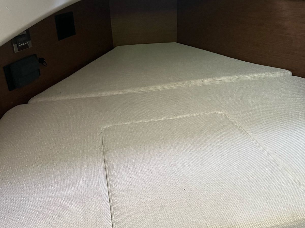 Interior of a 2020 Jeanneau Leader 9 with beige upholstery.