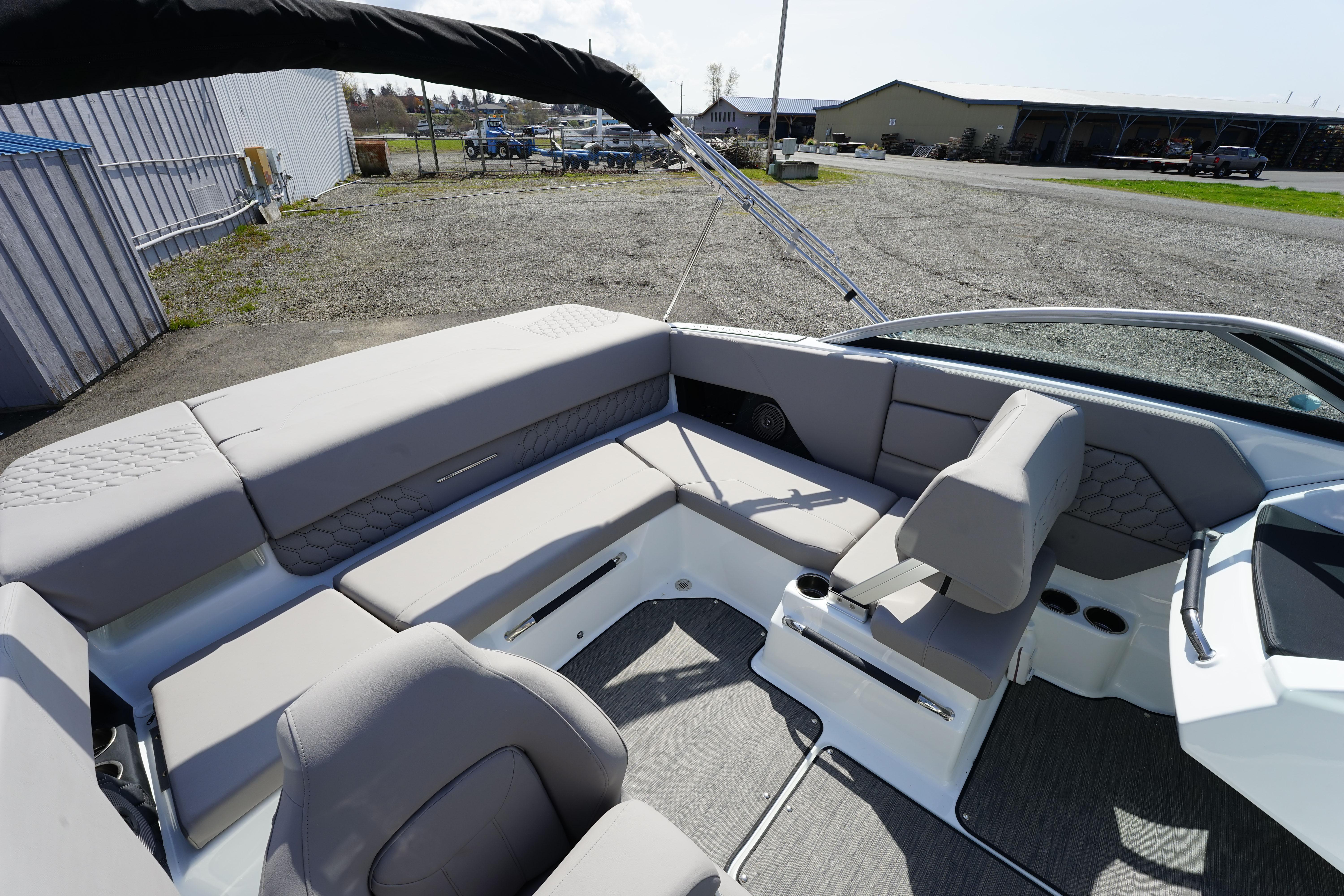 2023 Four Winns H1 boat interior with spacious seating and modern design.