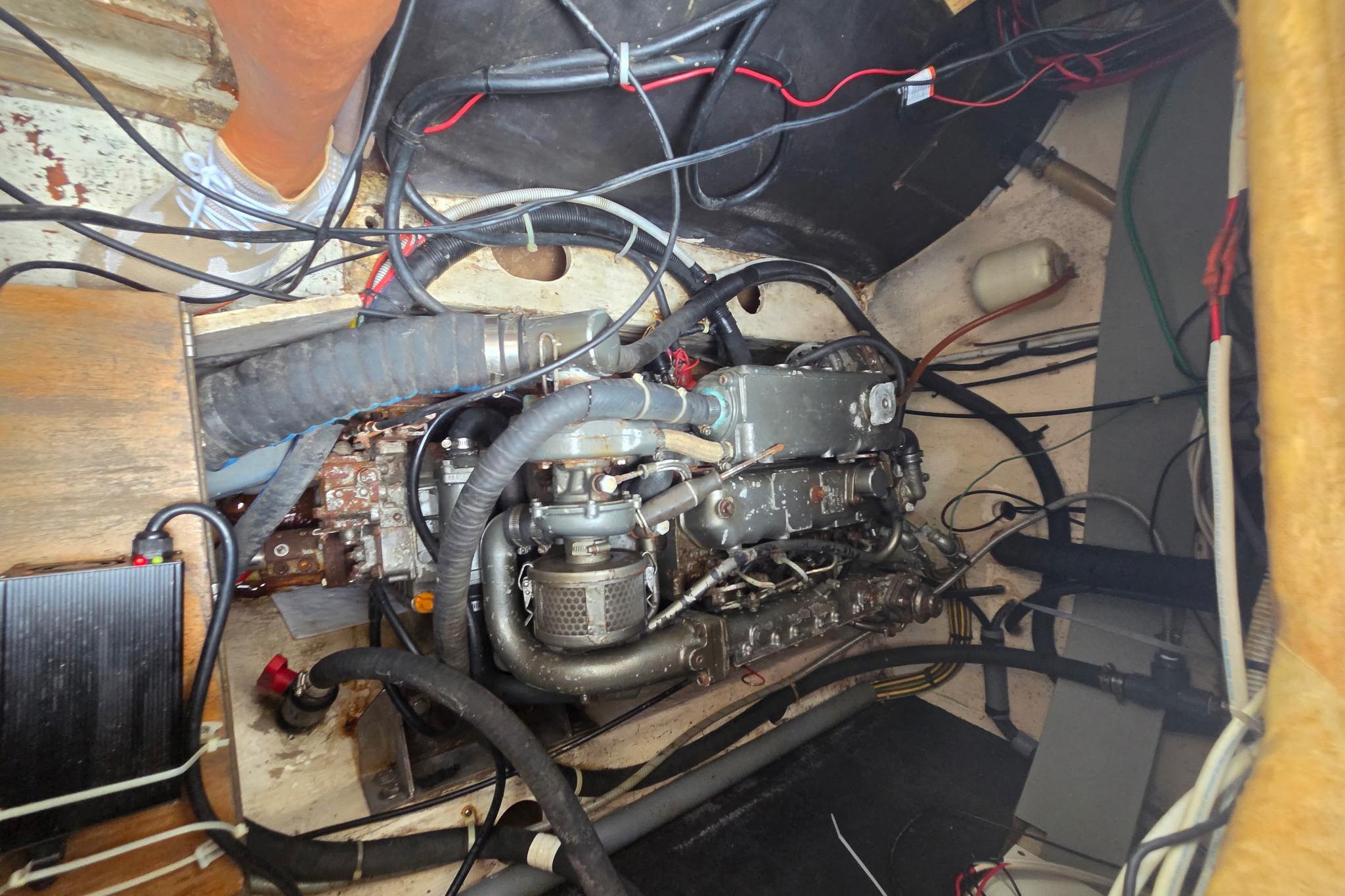 Engine compartment of a 2000 Fountaine Pajot Maryland 37 boat, showing wiring and components.