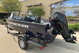 2026 Tracker Pro Guide V-175 WT boat on trailer, outdoor setting.