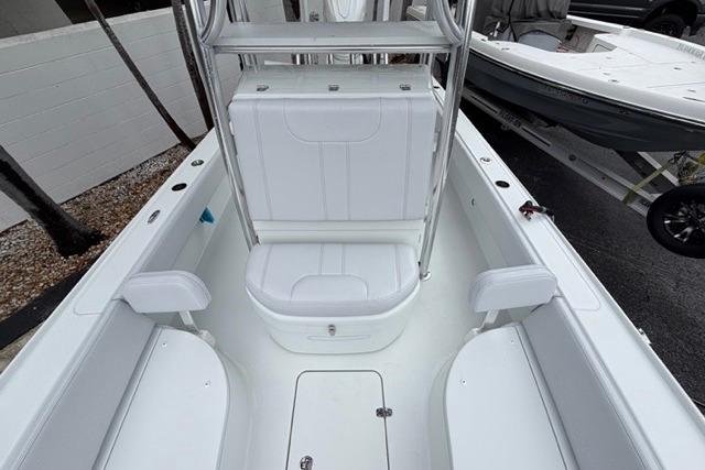 2025 Contender 26 Bay boat interior with seating and storage compartments.