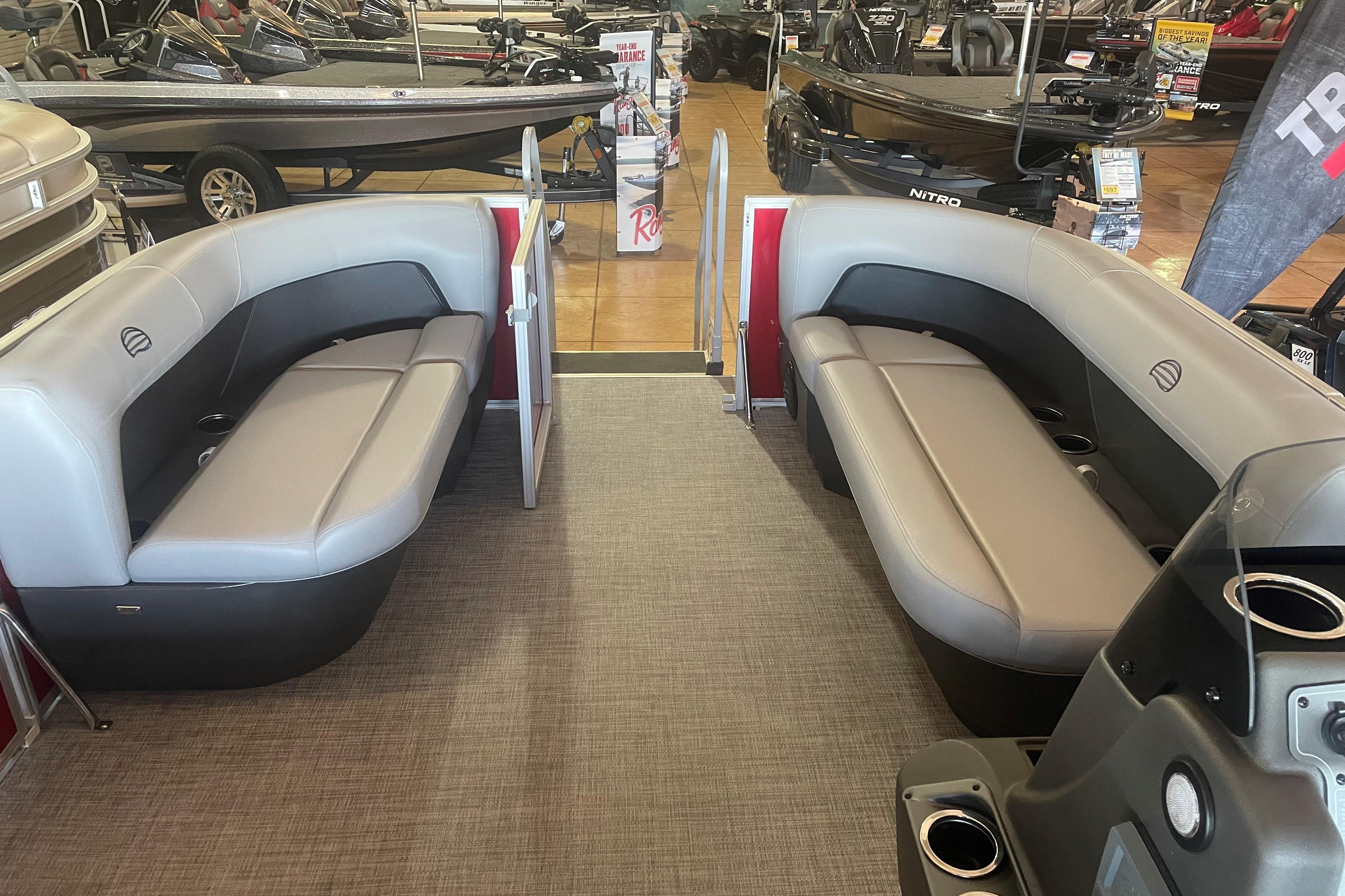 2026 Sun Tracker Party Barge 16 DLX interior with spacious seating and modern design.