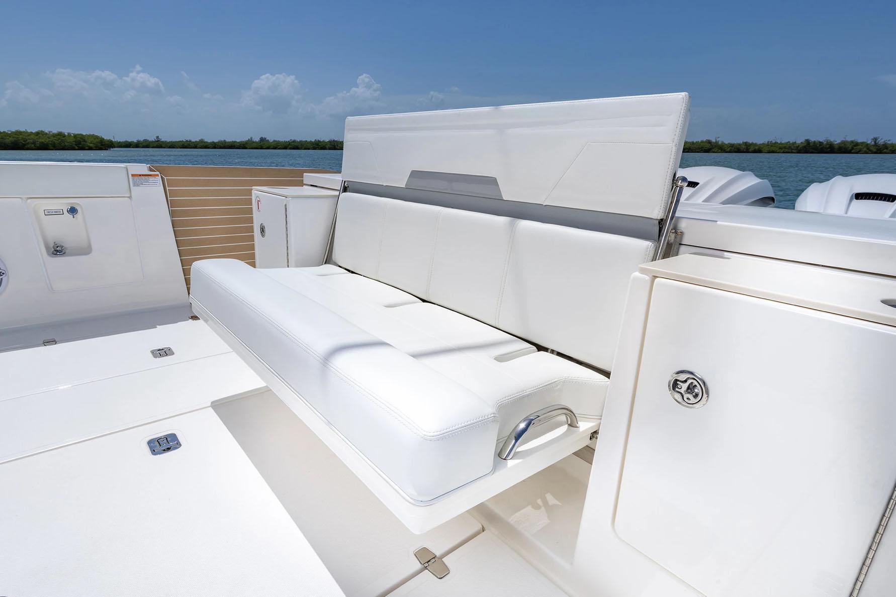Manufacturer Provided Image: 2025 Pursuit OS 445 Offshore boat with white seating and sleek design.