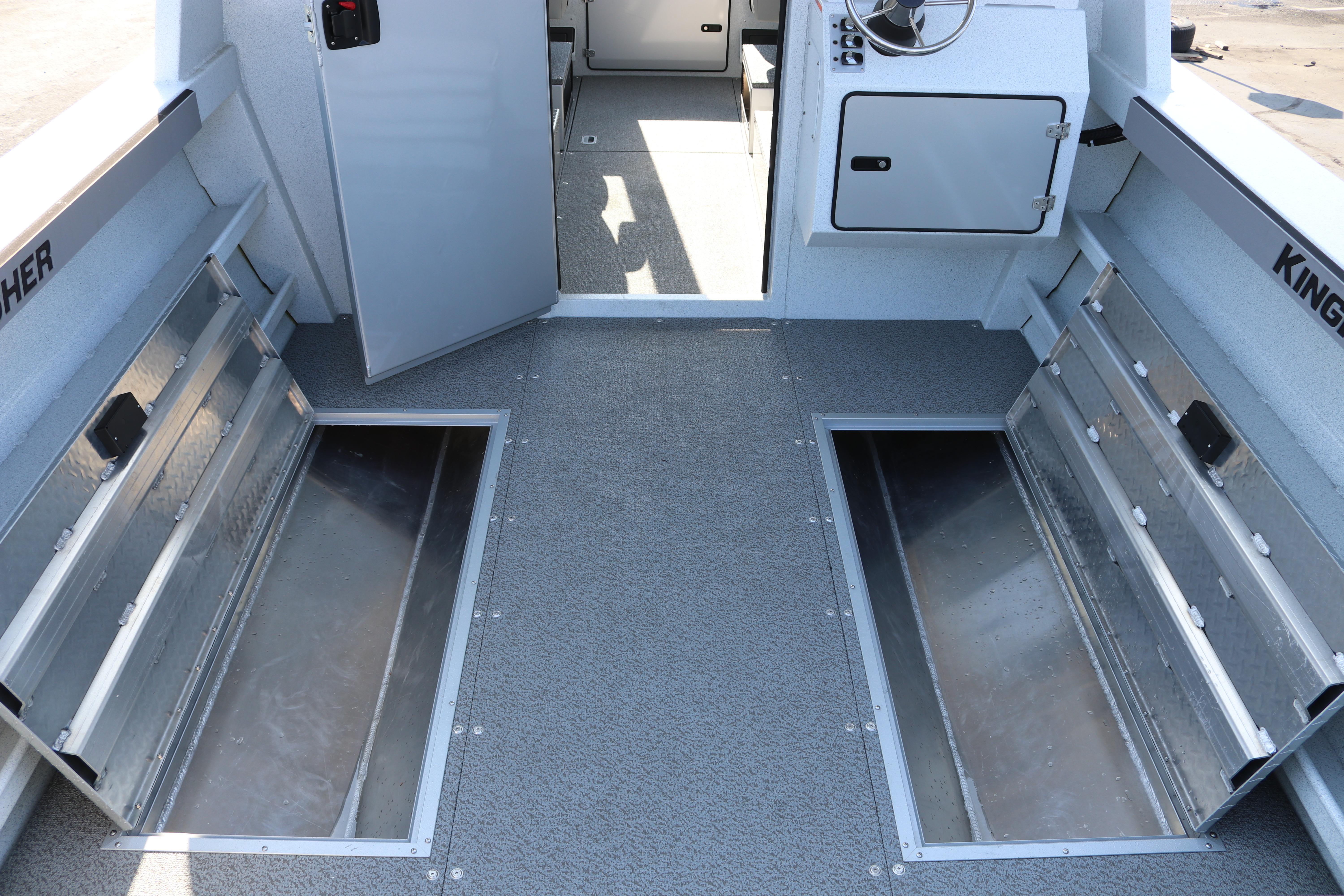 2026 KingFisher 2425 Escape HT boat interior with open storage compartments.