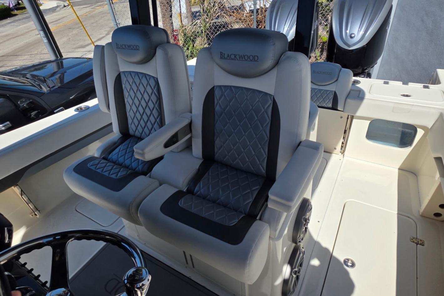 2024 Blackwood 290 boat interior with luxurious seating and modern design.