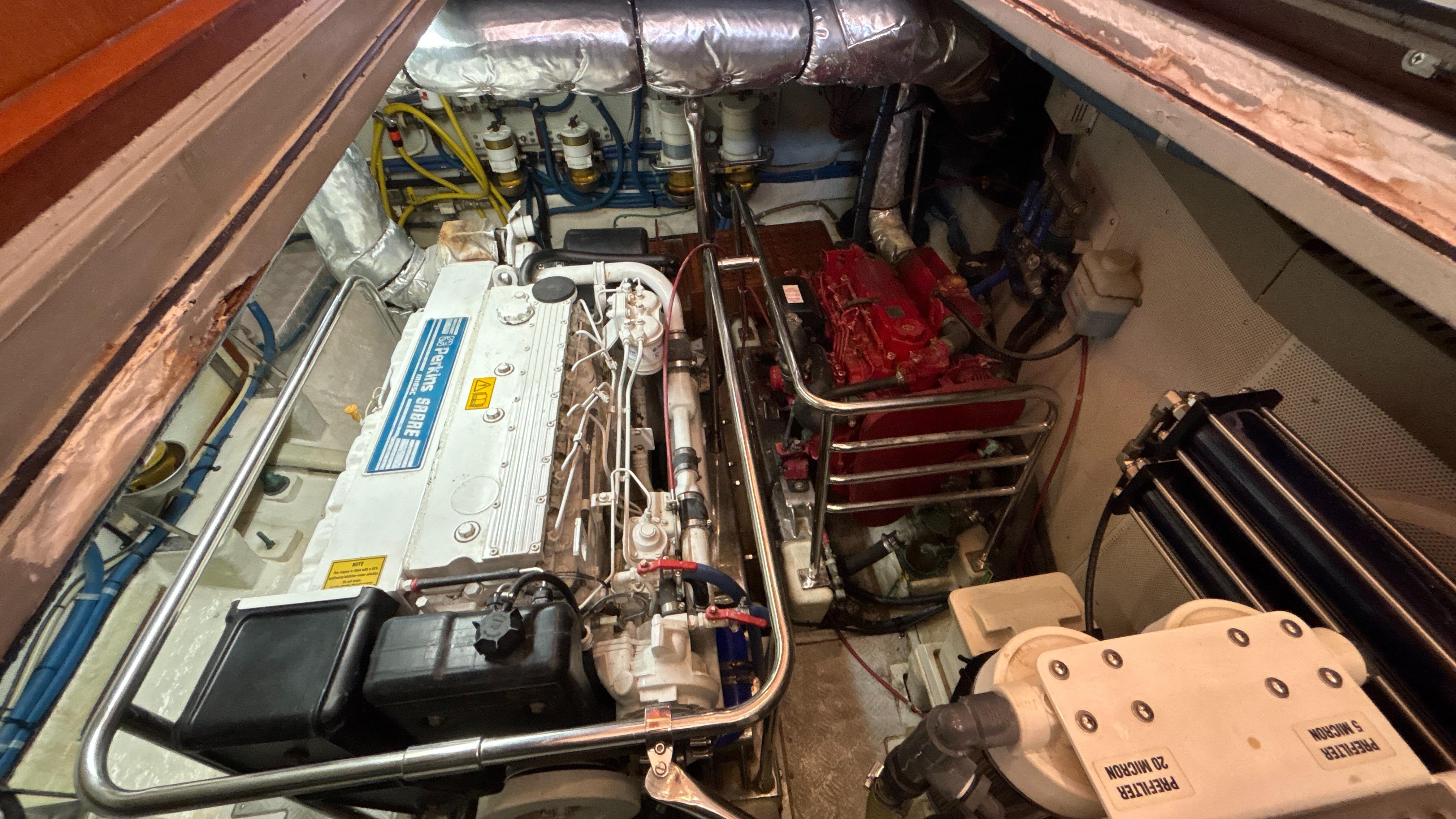 Engine room of 2005 Selene 40 Ocean Trawler, featuring detailed machinery and components.