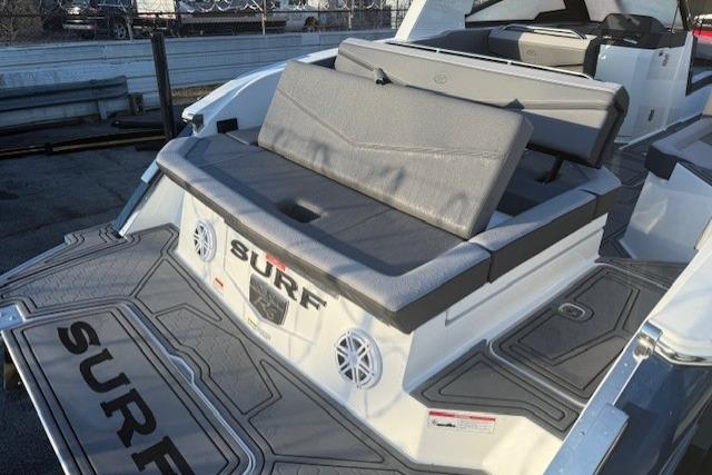 2023 Cobalt R6 Surf boat with sleek seating and modern design features.