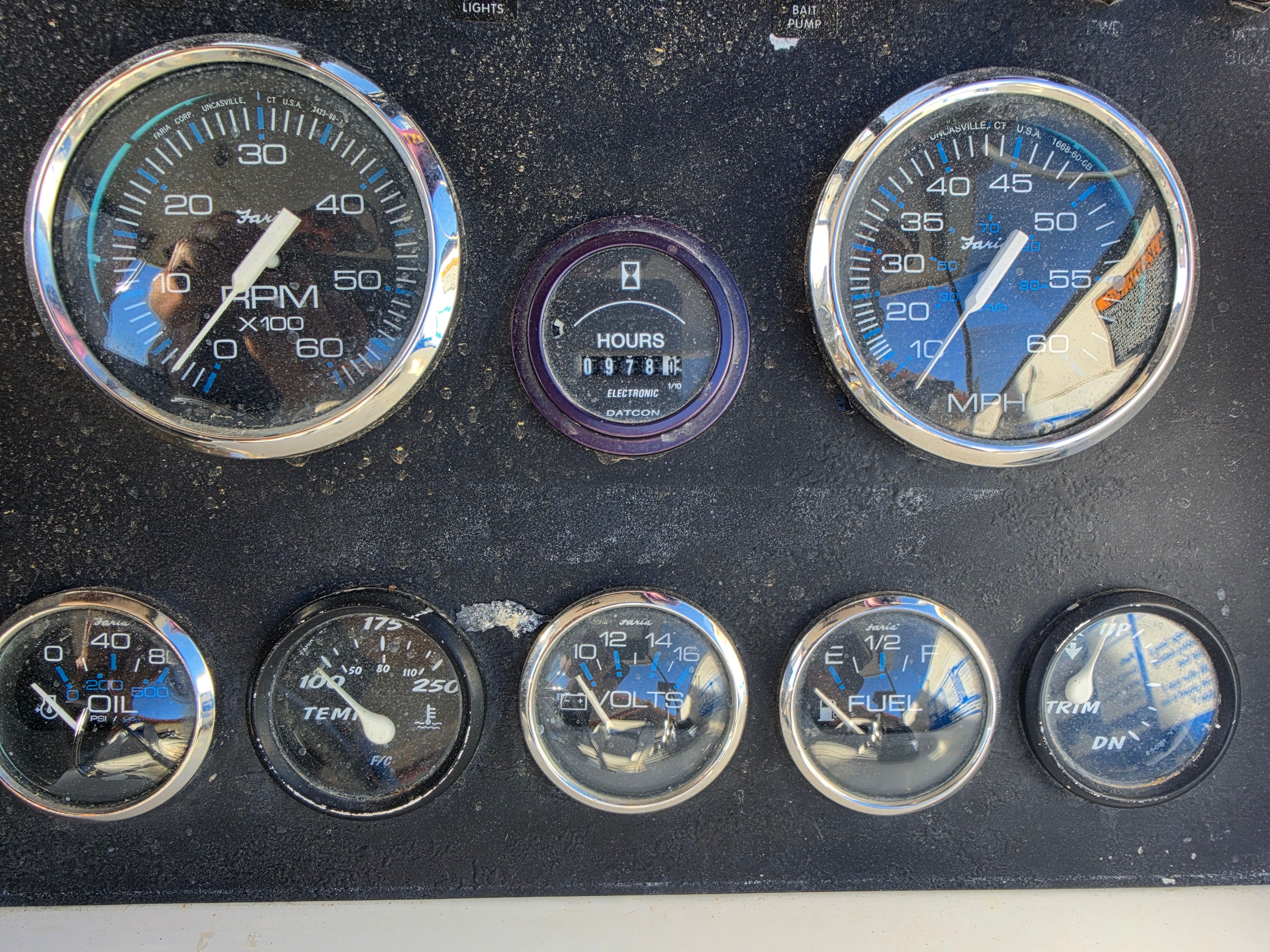 Dashboard of a Bayliner 2352 Trophy Walkaround with various gauges and instruments.