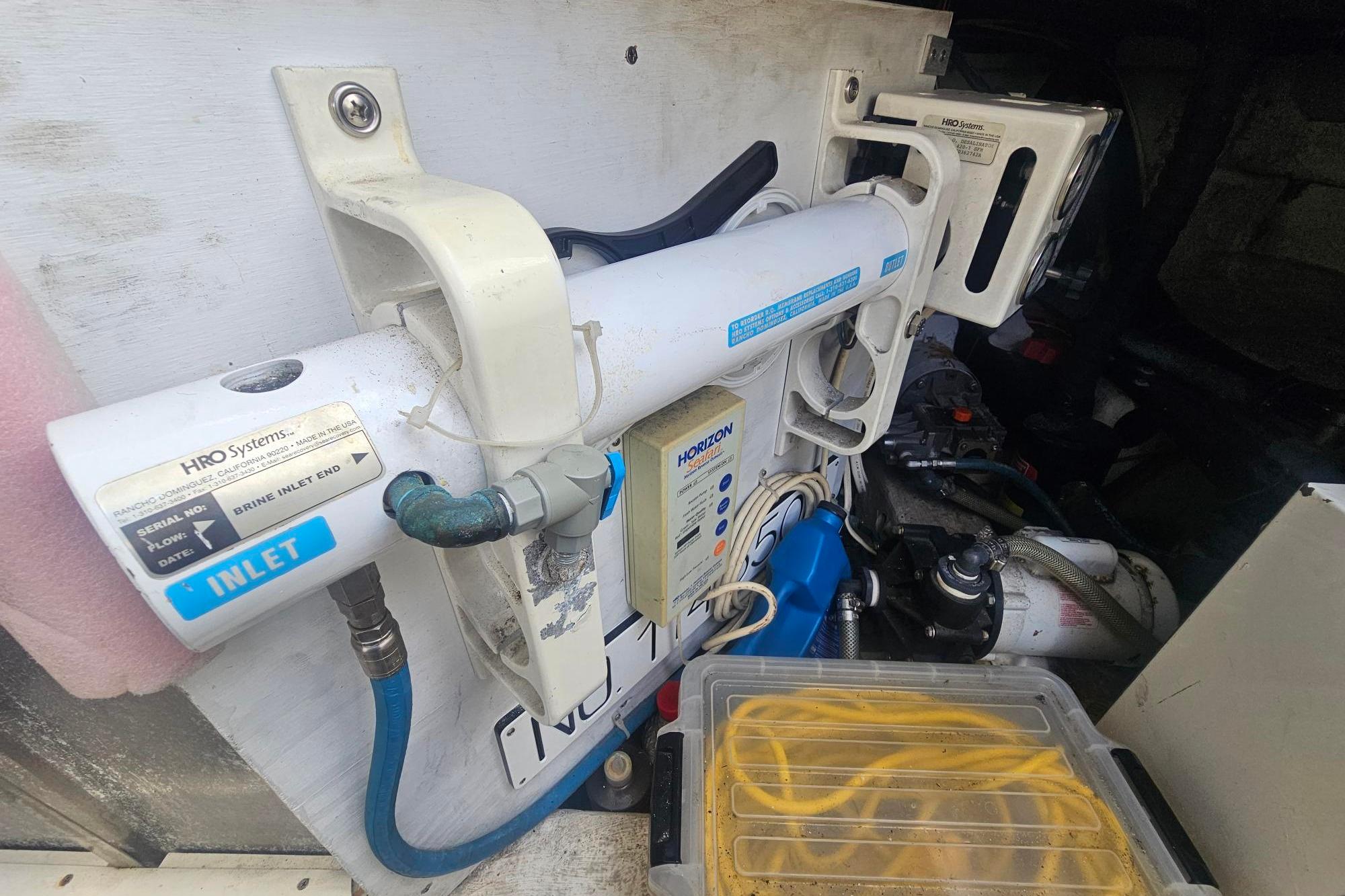 Water filtration system in a 2002 Carver 450 Voyager Pilothouse boat engine room.