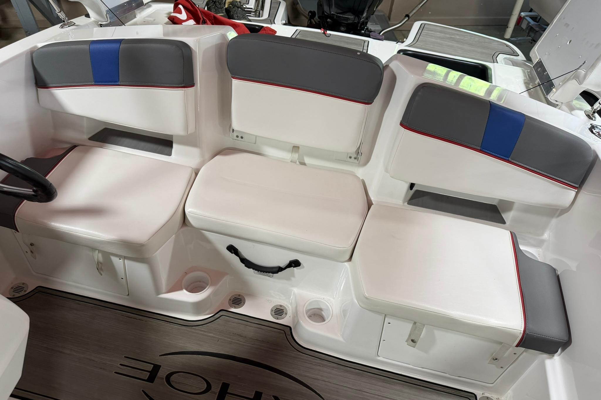 2024 Tahoe T18 boat interior with cushioned seating and modern design.