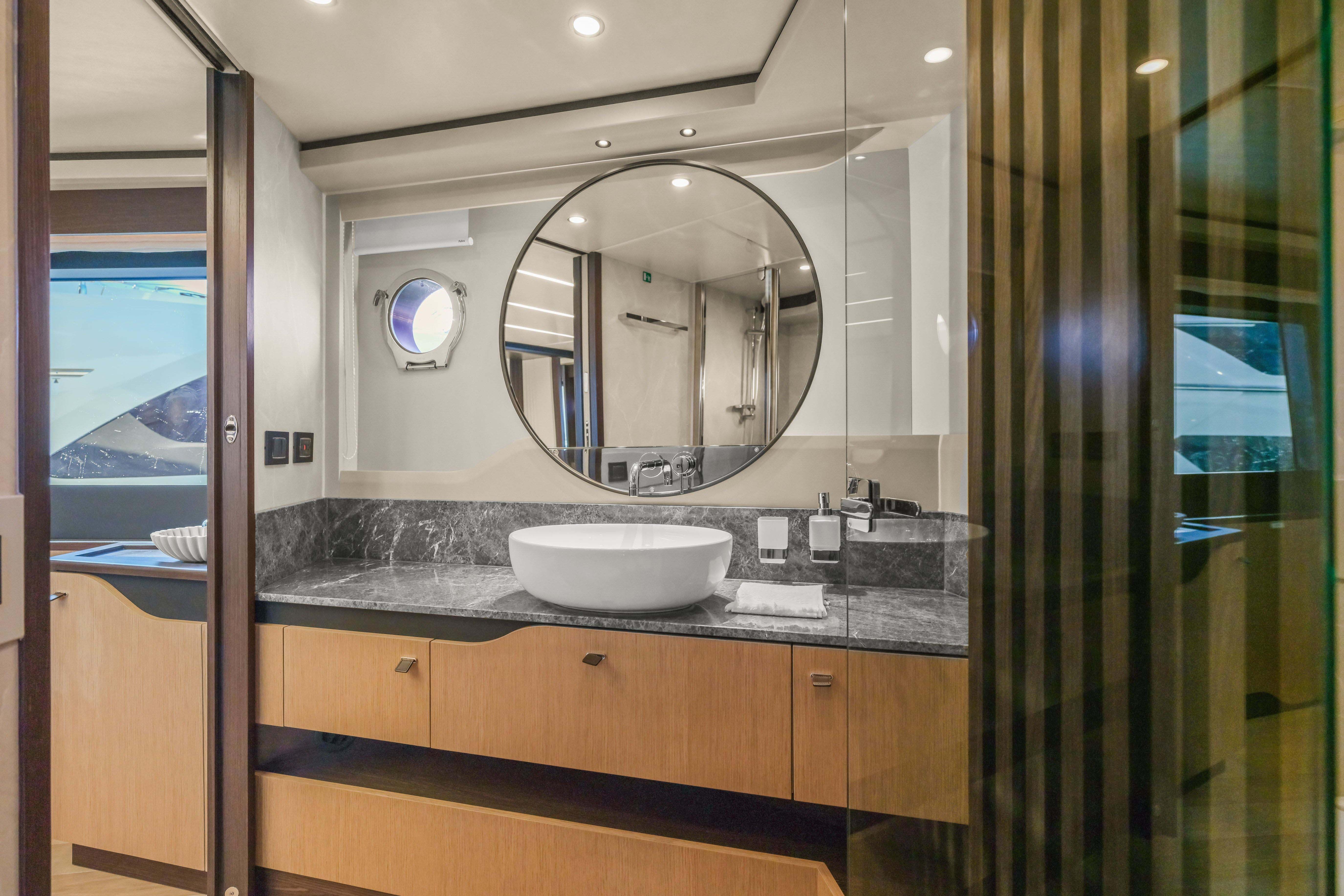 Luxurious bathroom interior of 2026 Absolute 52 Fly yacht with modern fixtures and elegant design.