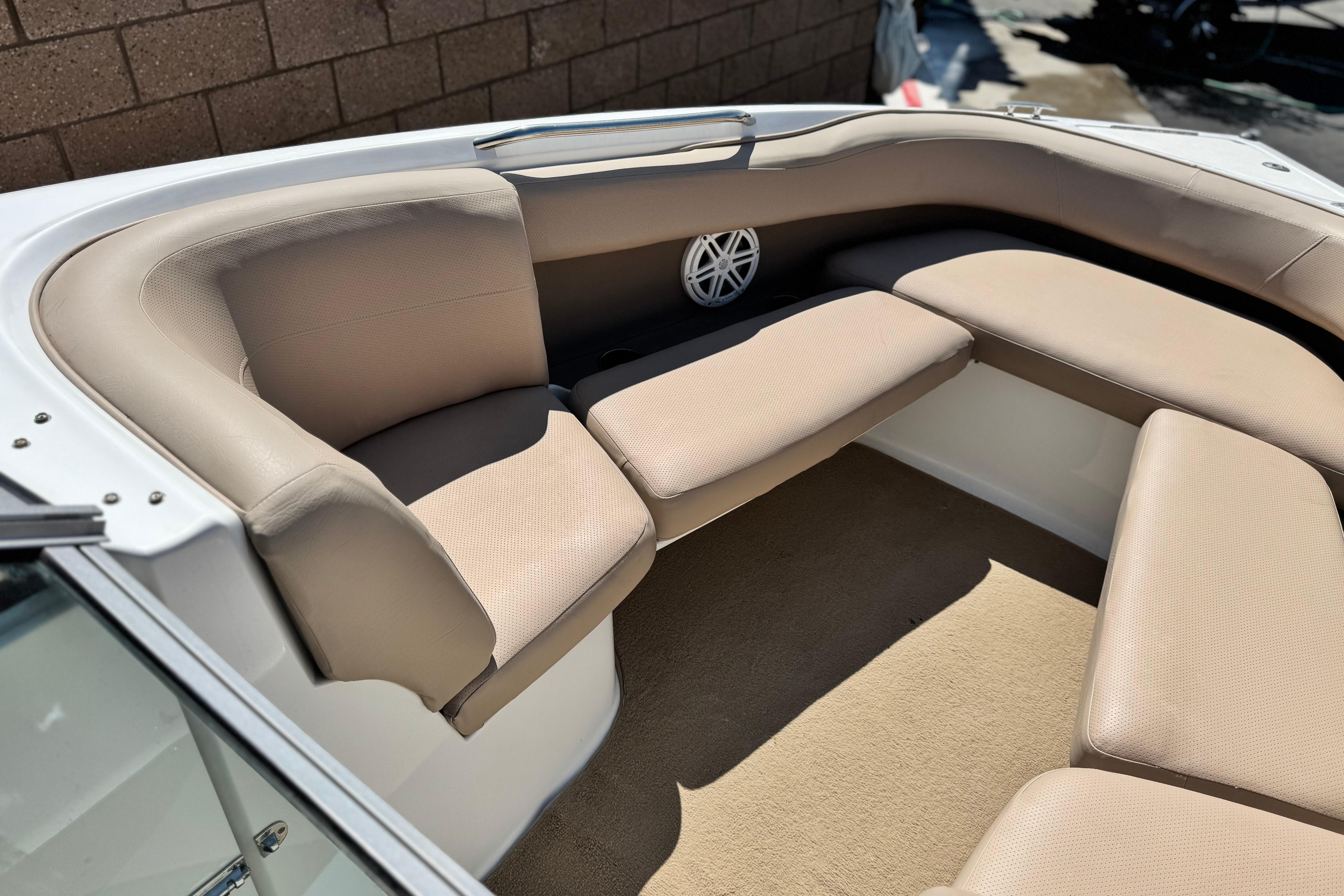 2008 Cobalt 262 boat interior with beige seating and speaker.