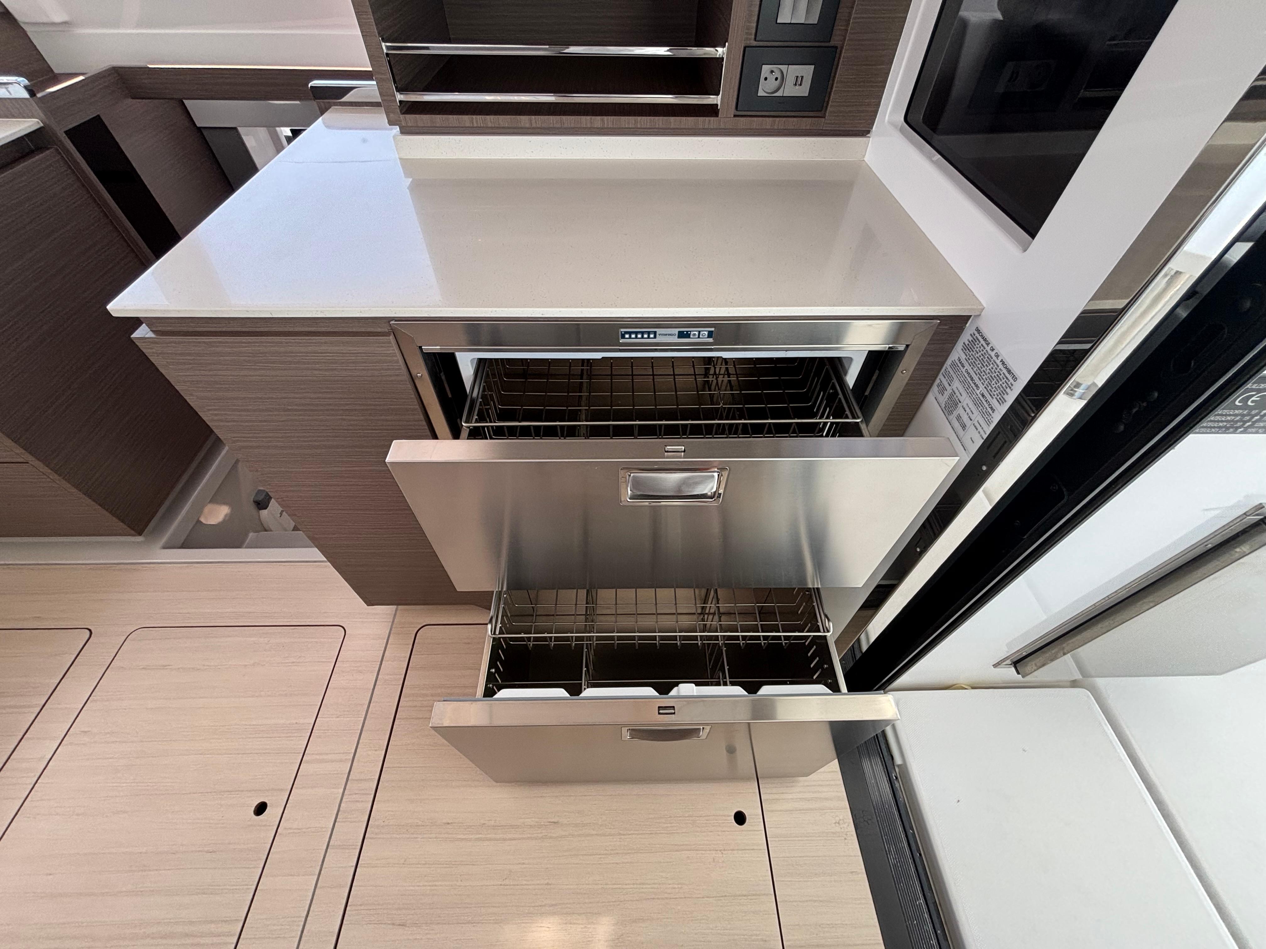 Modern kitchen drawers in a 2025 Leopard 42 yacht, featuring sleek stainless steel design.
