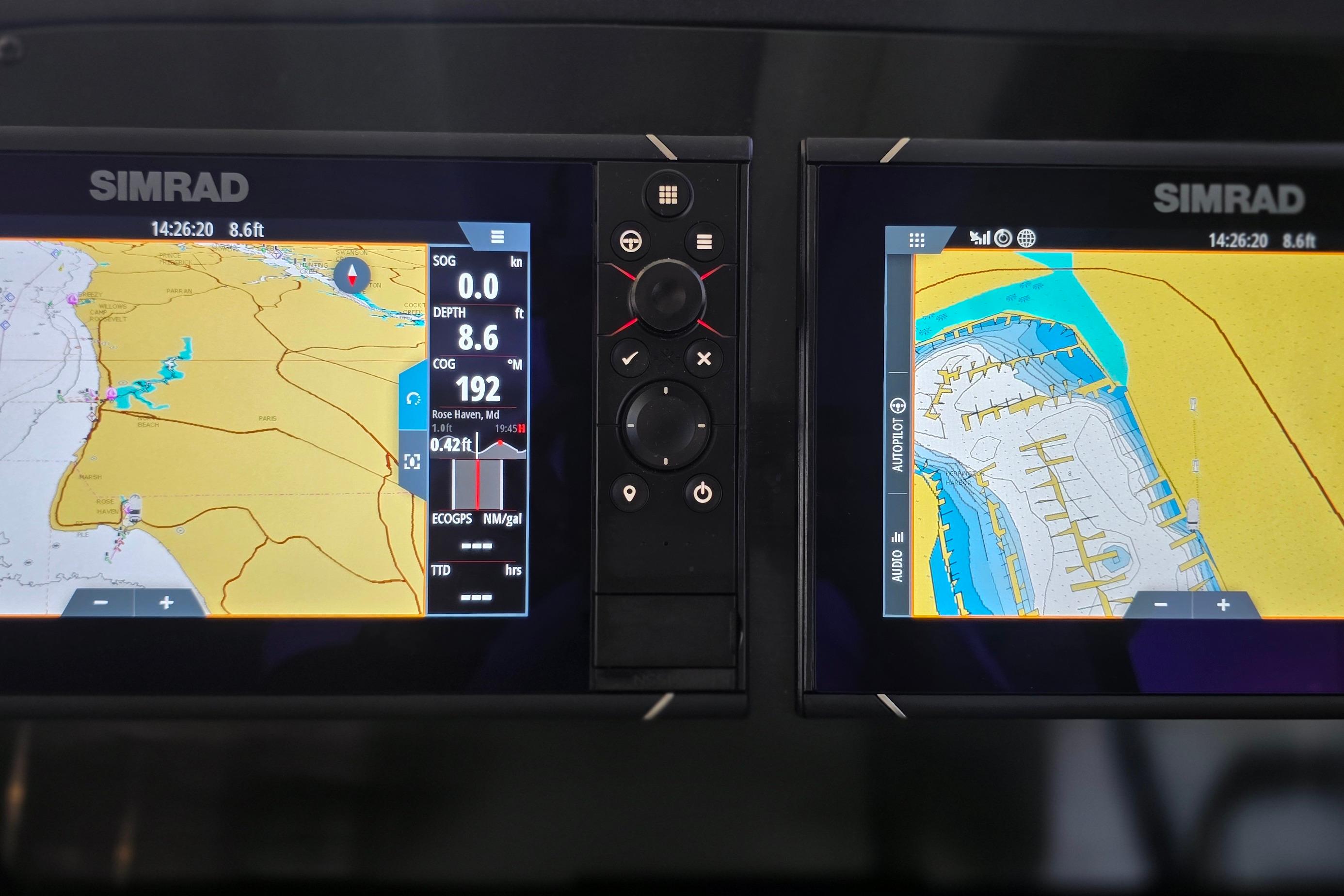Simrad navigation display on 2023 Greenline 40 yacht, showing nautical charts and data.