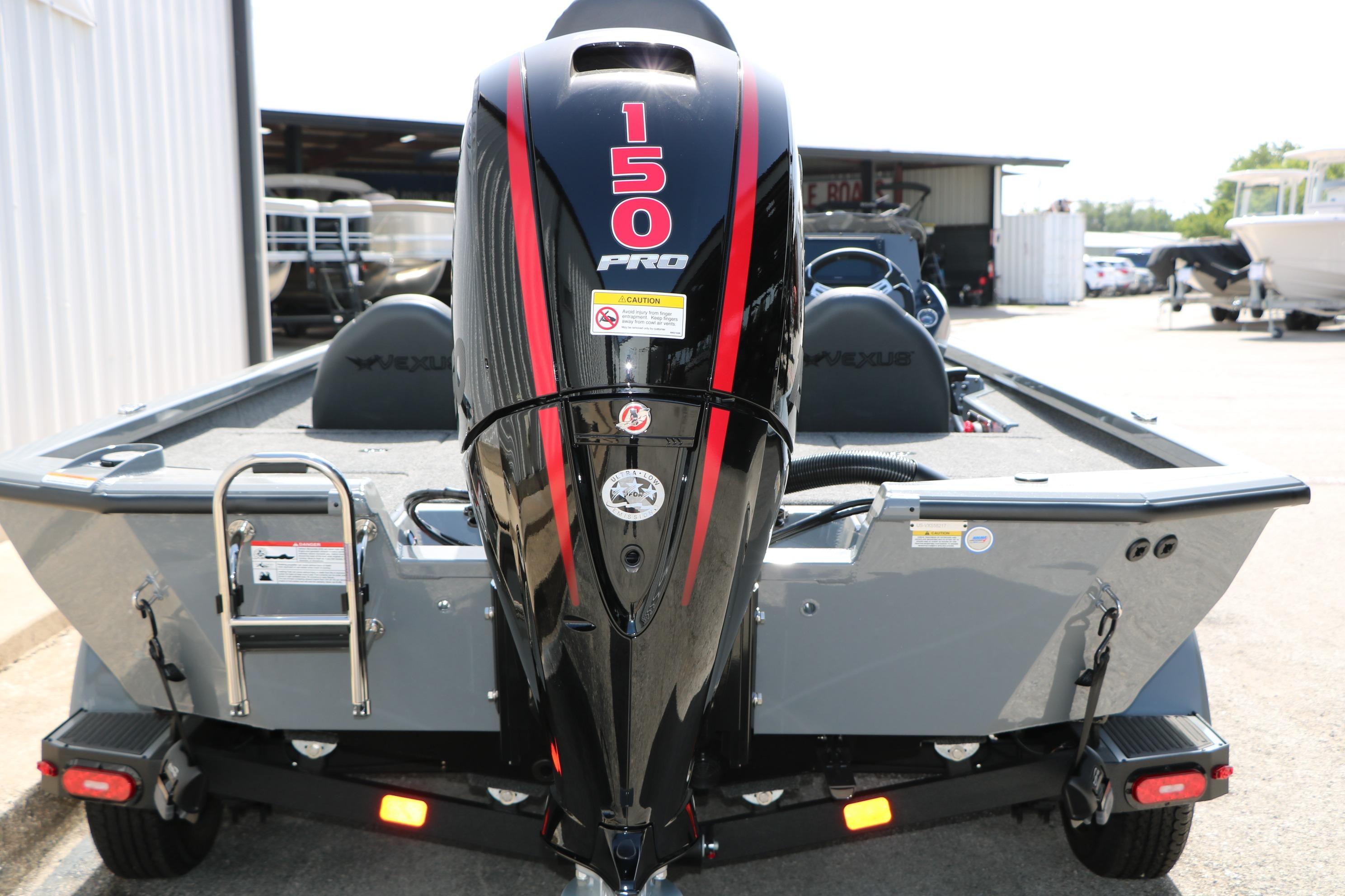 2026 Vexus AVX1980 boat with a powerful 150 Pro engine, parked outdoors.