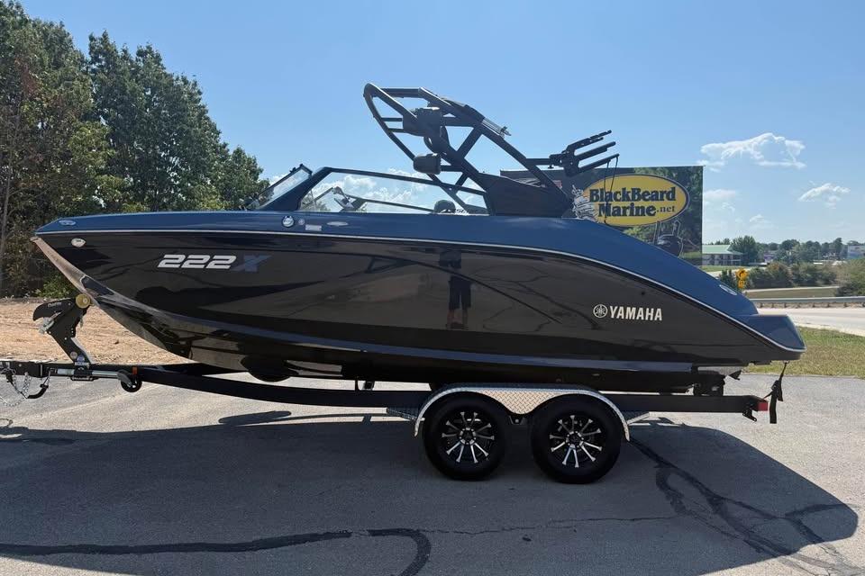 2026 Yamaha Boats 222XE on trailer at BlackBeard Marine dealership.