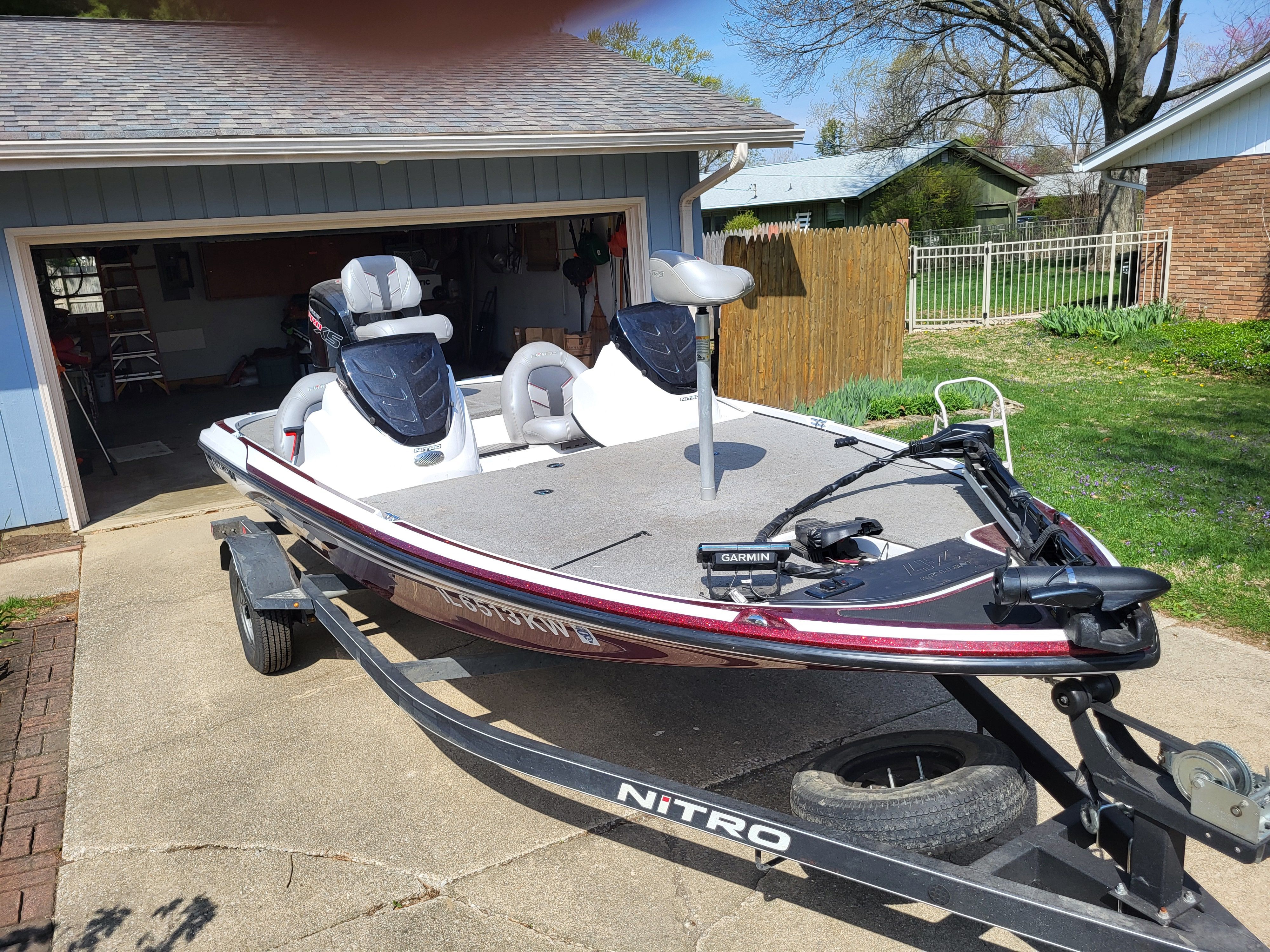 2017 Nitro Z17 on a trailer in front of a garage.