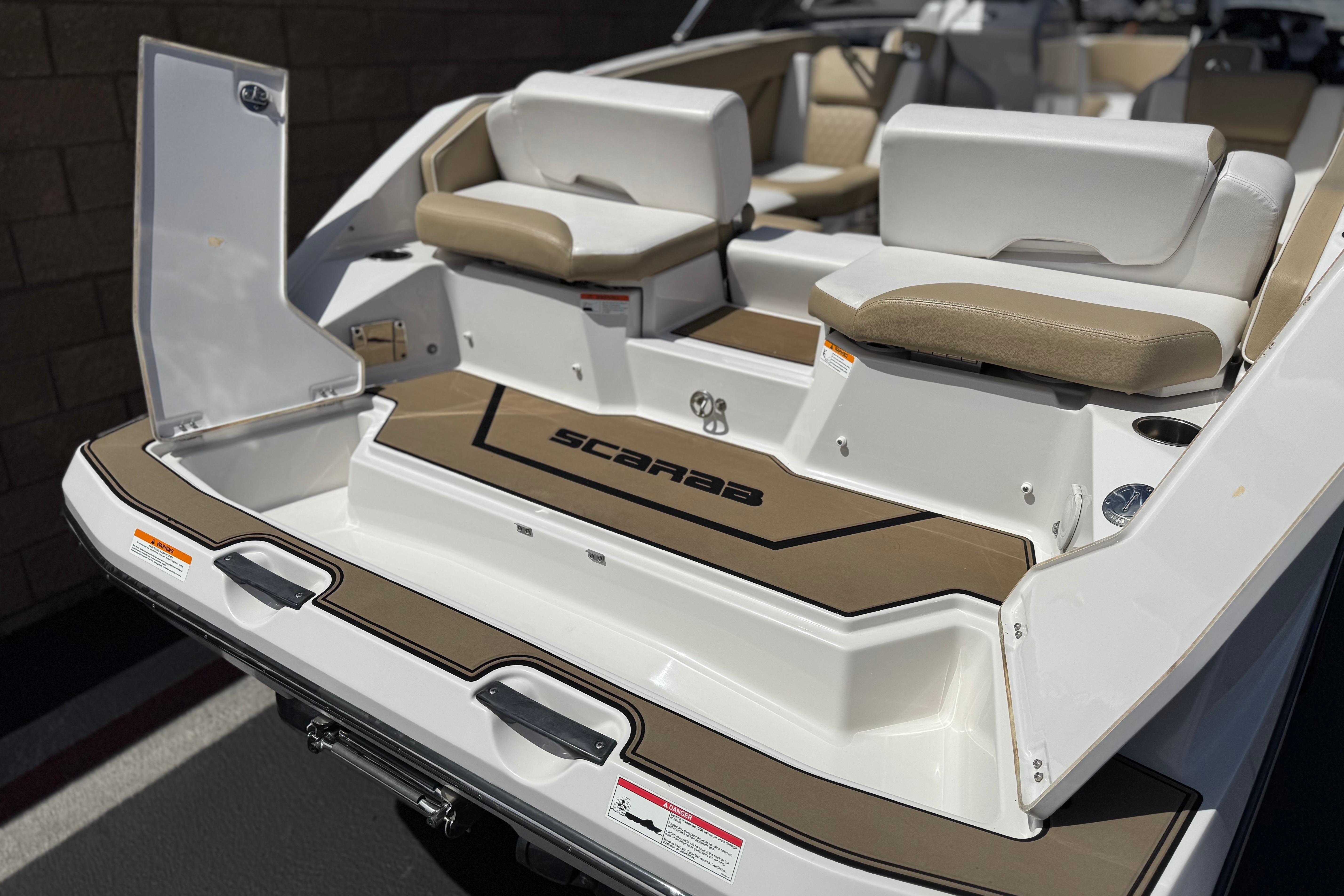 2017 Scarab 255 H.O. Platinum boat interior with seating and storage compartments.