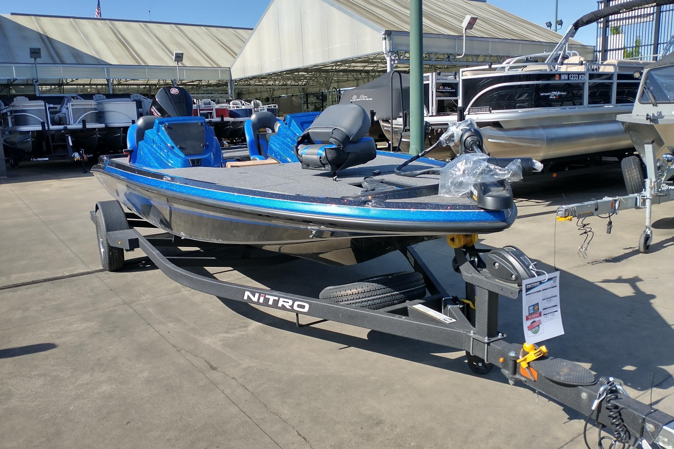 2026 Nitro Z19 XL boat on trailer in outdoor showroom.